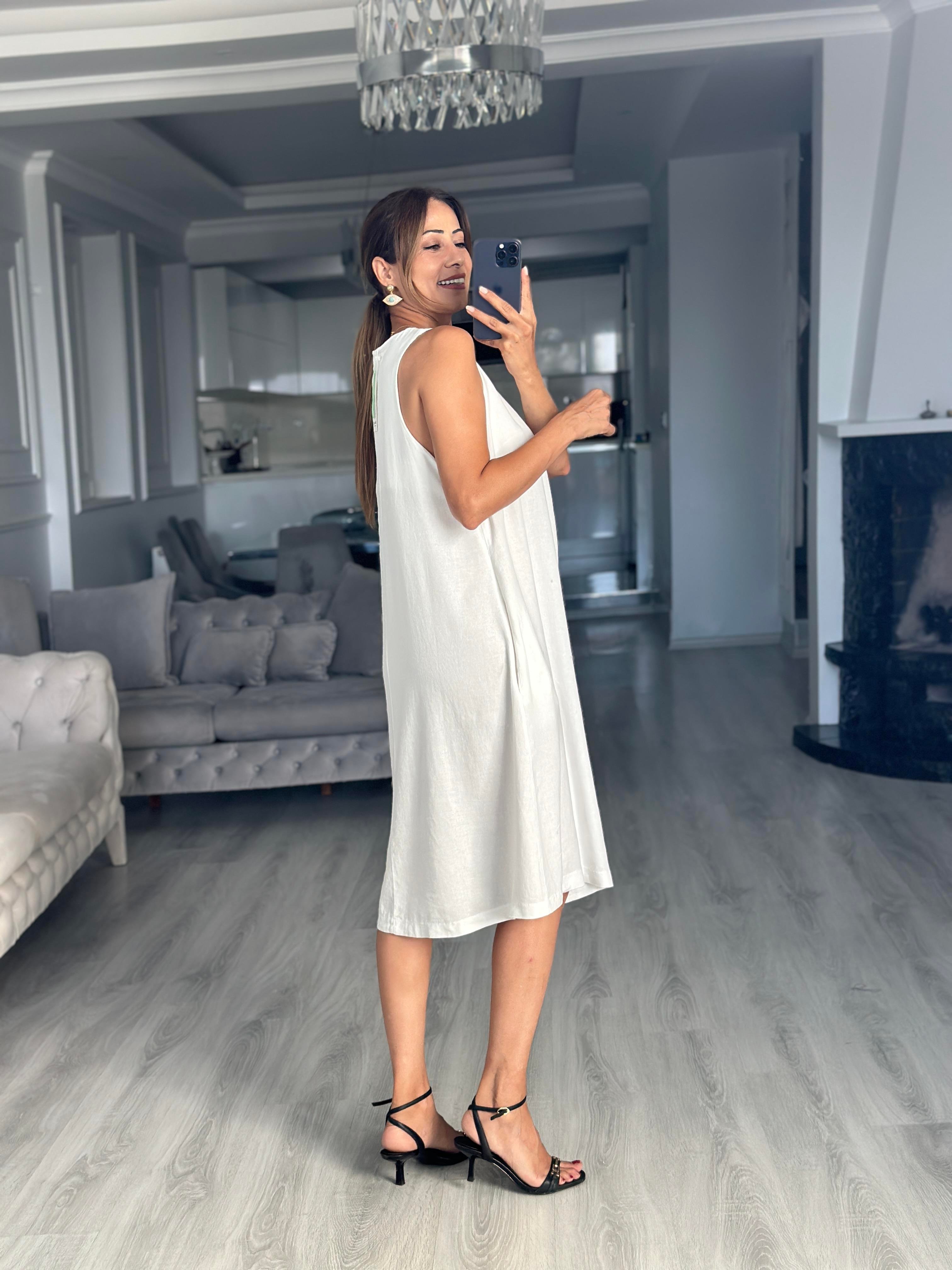 Beyaz Keten Önü Pensli V Yaka Sıfır Kol Cepli Kadın Midi Boy Elbise