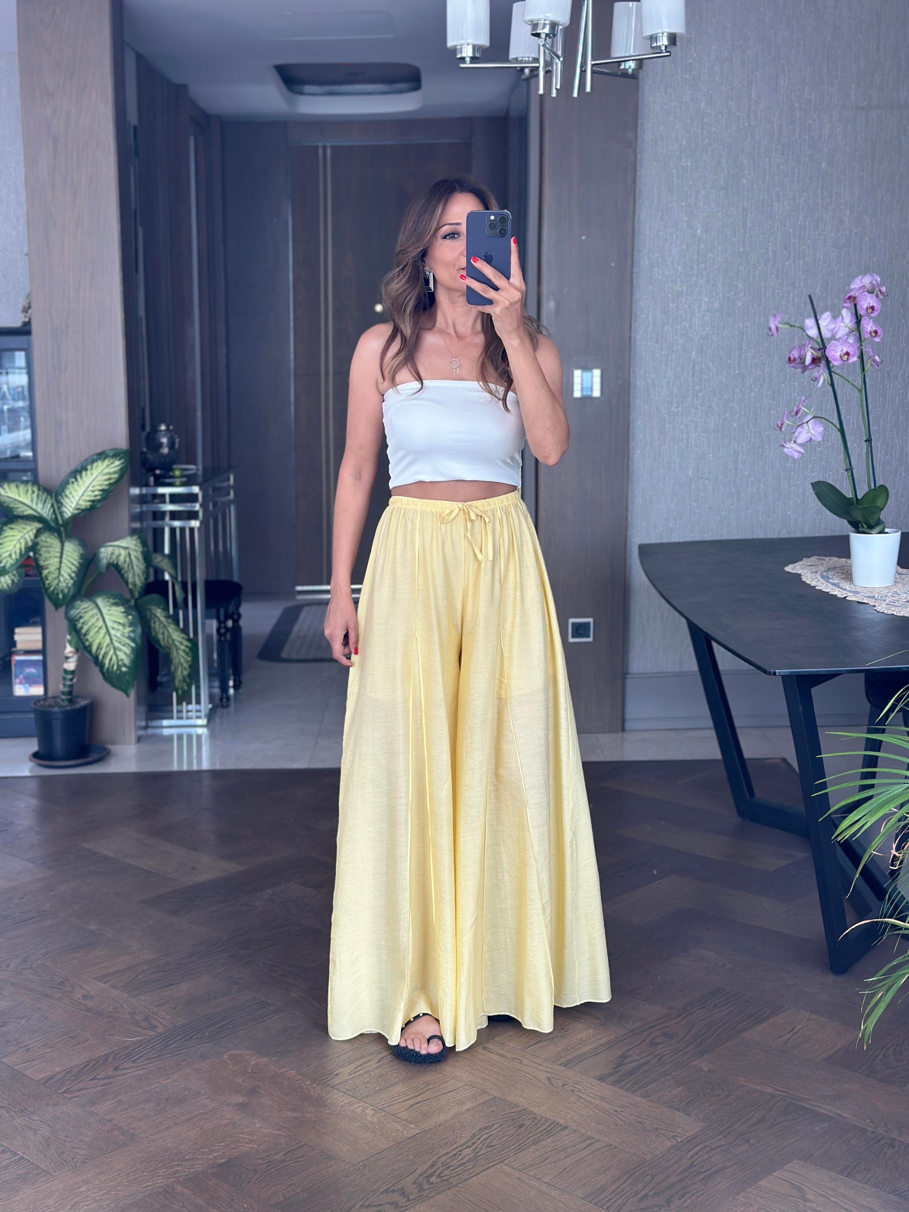 Sarı Ters Dikiş Parçalı Bağcıklı Geniş Paça Kadın Pantolon