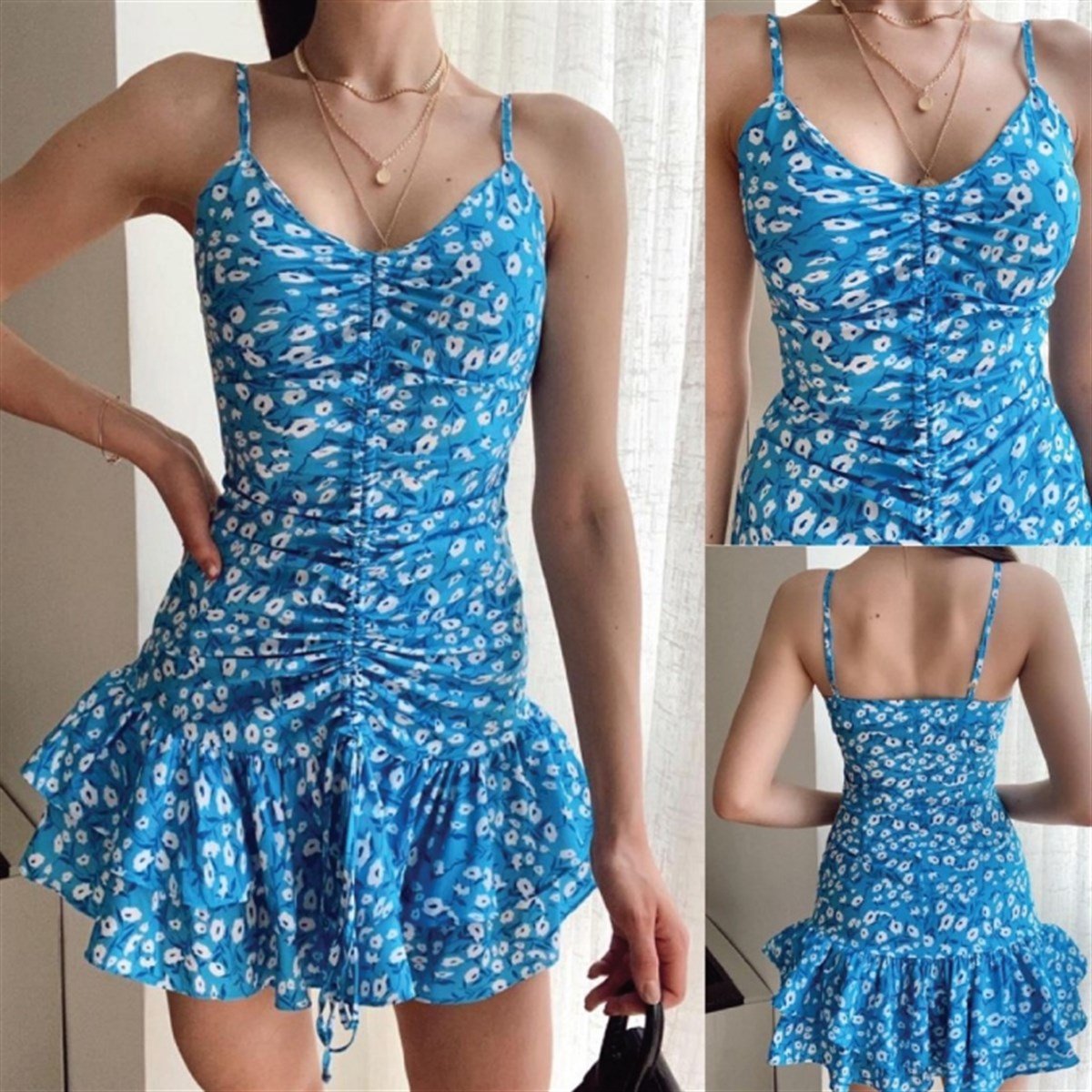 ETEĞİ KAT DİKİŞLİ BÜZGÜLÜ TASARIM ELBİSE