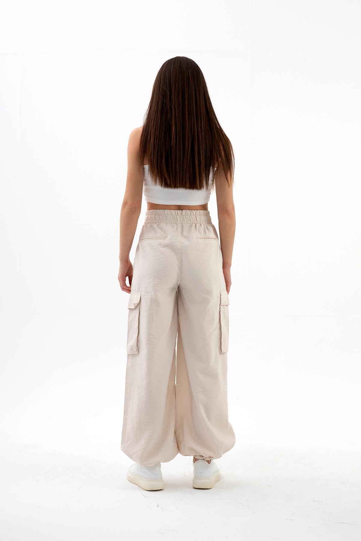 Yüksek Bel Beli ve Paçası Lastikli Paraşüt Kumaş Pantolon - Taş
