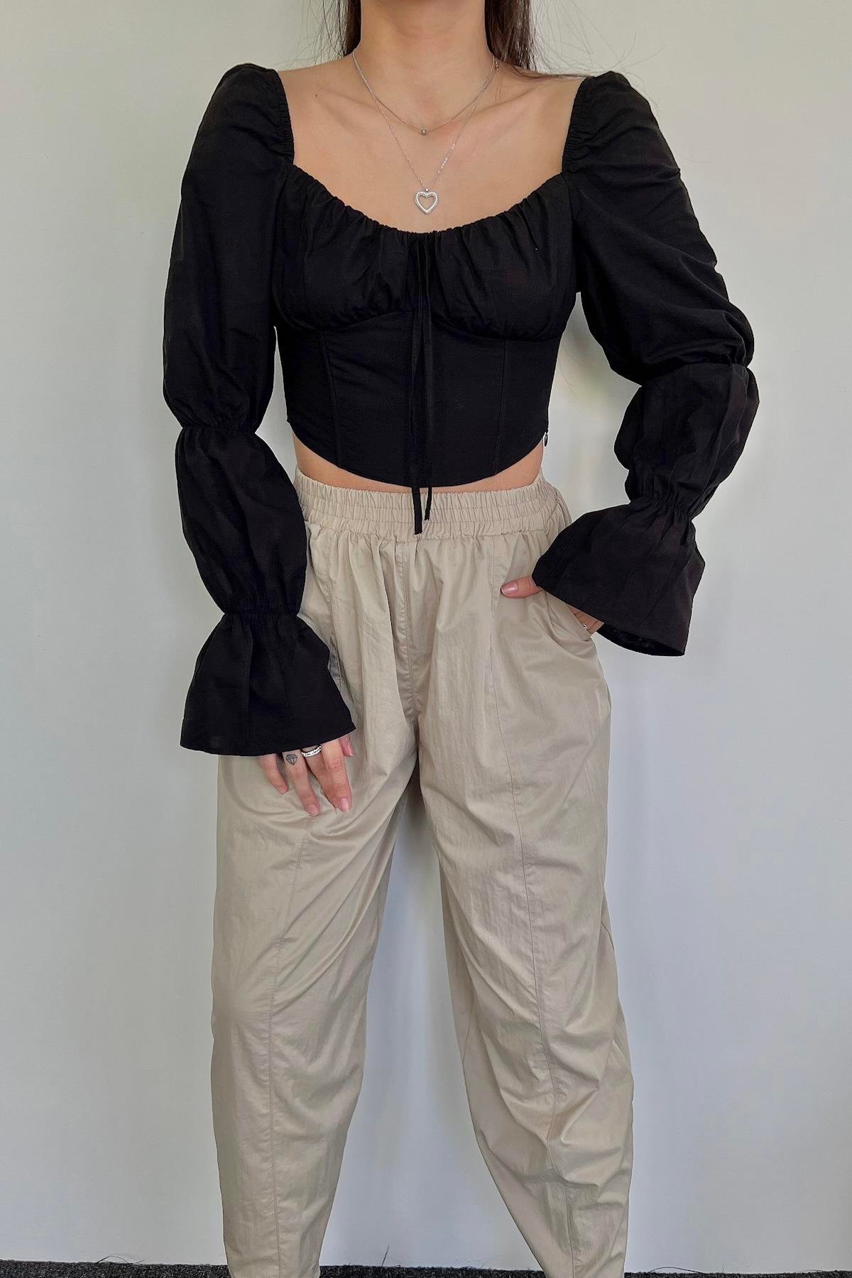 بلوزة بأكمام إسبانية