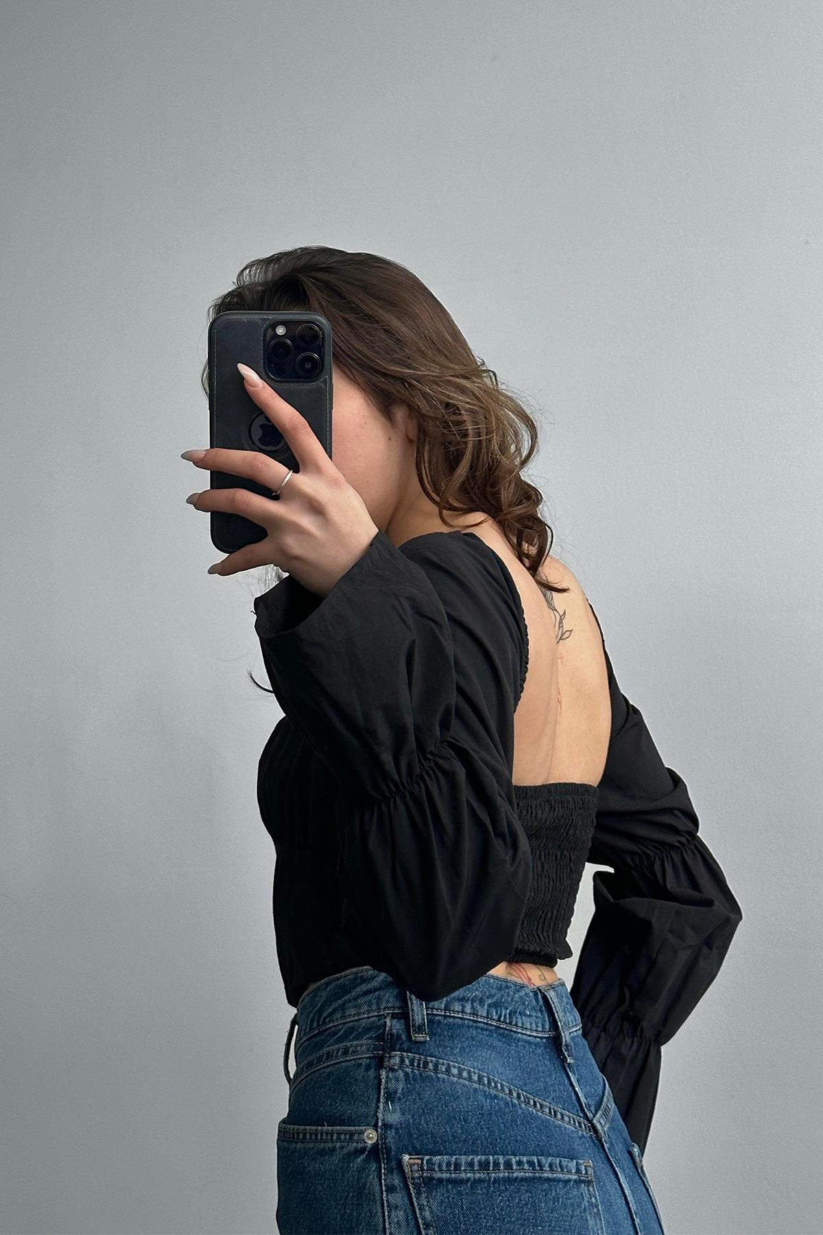 بلوزة بأكمام إسبانية