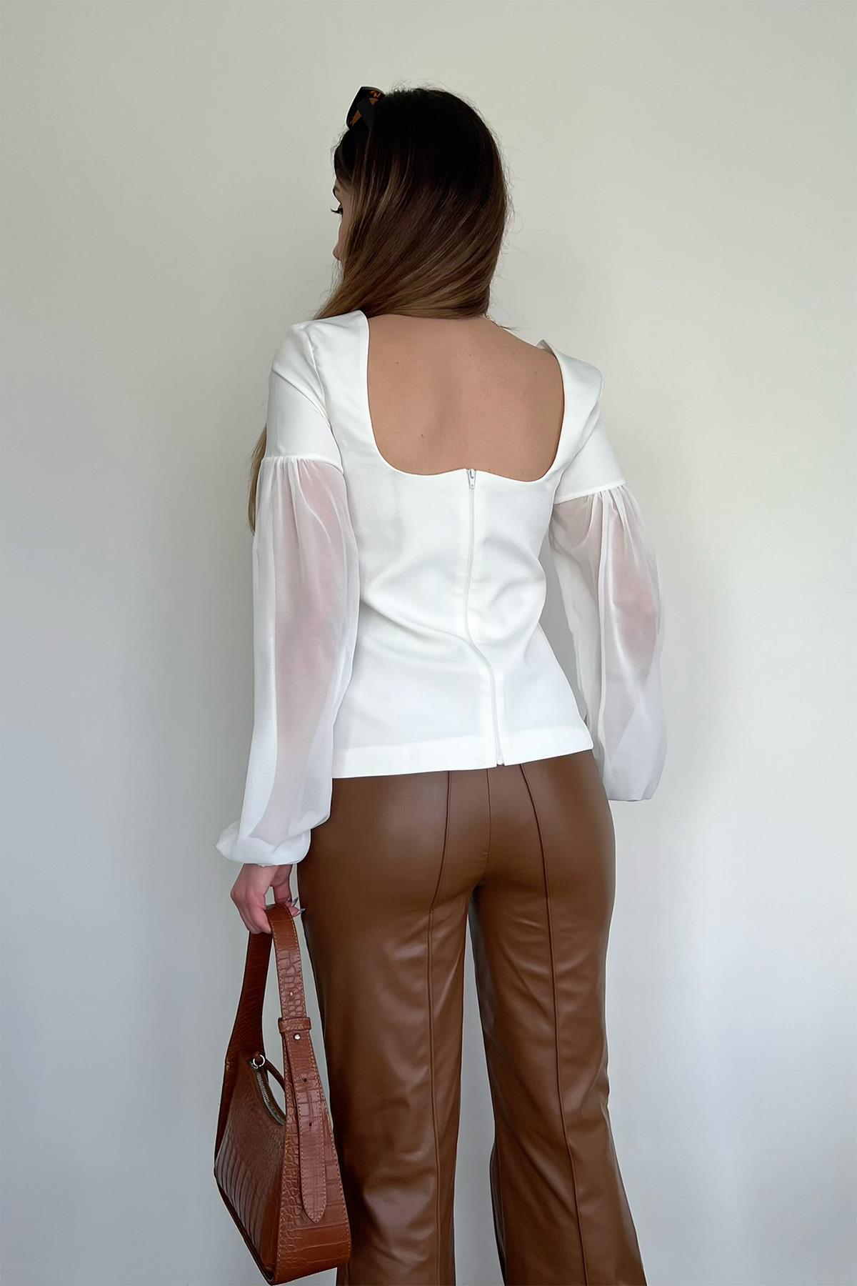 TÜLLBLUSE MIT HERZKRAGENÄRMELN