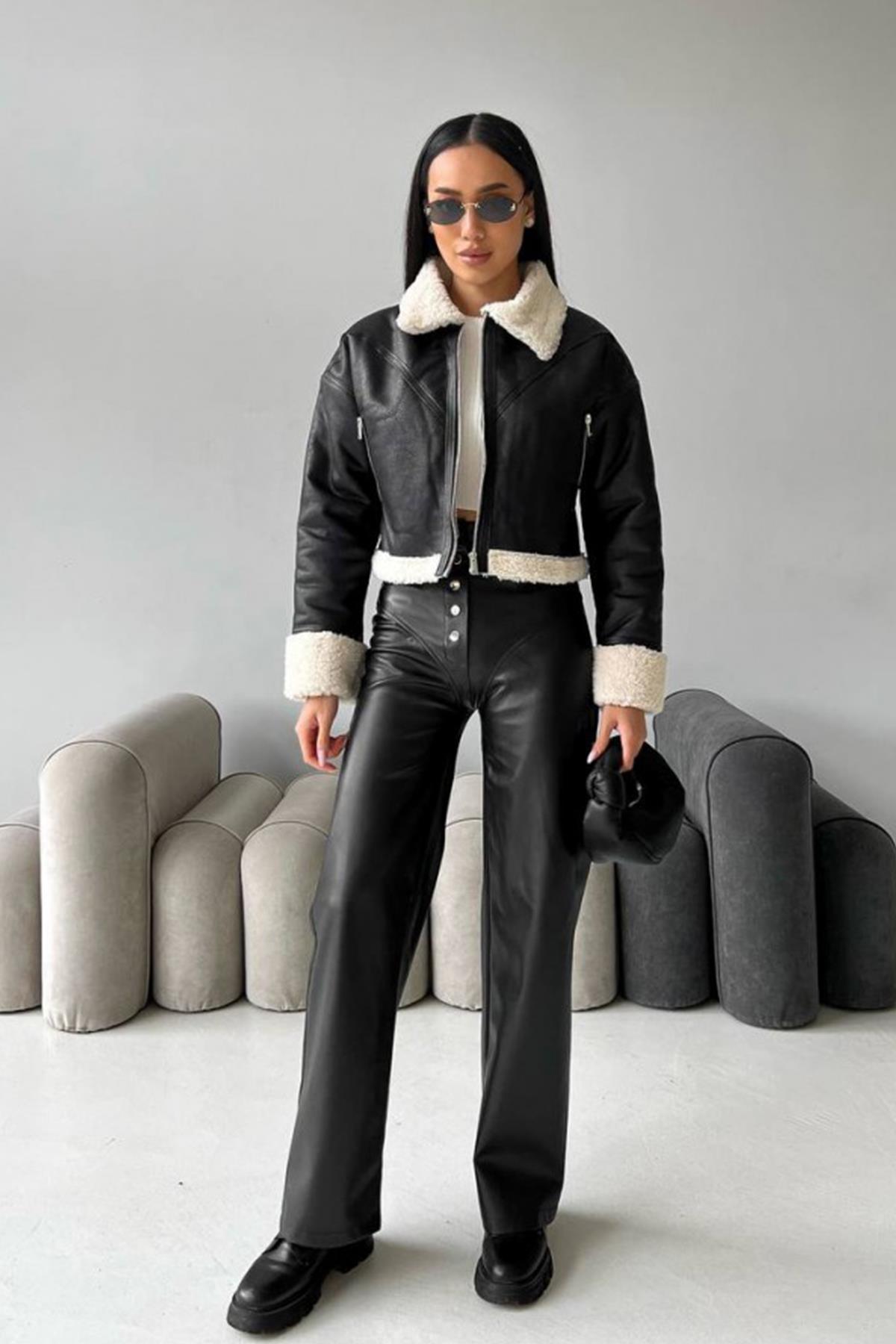 سترة جلدية قصيرة بحزام تيدي