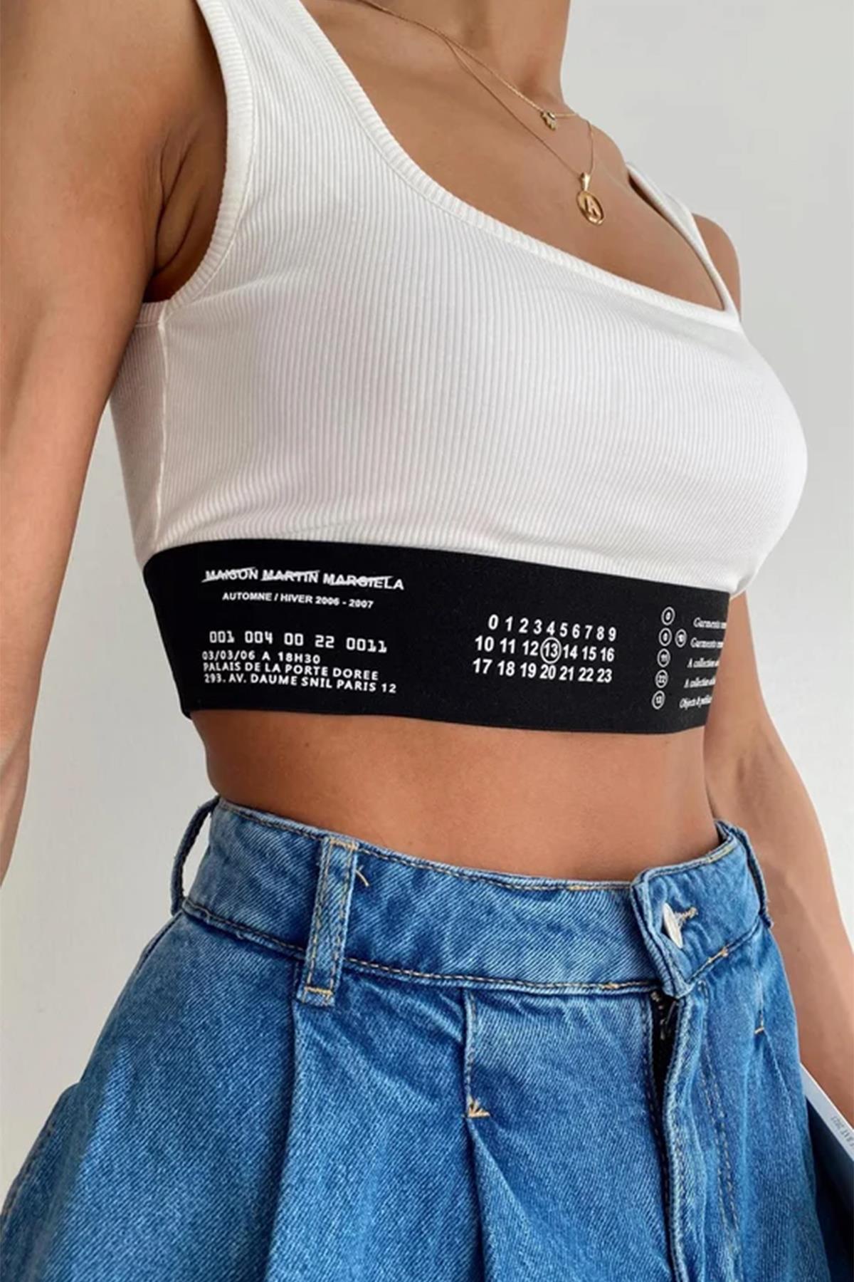 محصول مدعوم مع تفاصيل الخصر المكتوبة