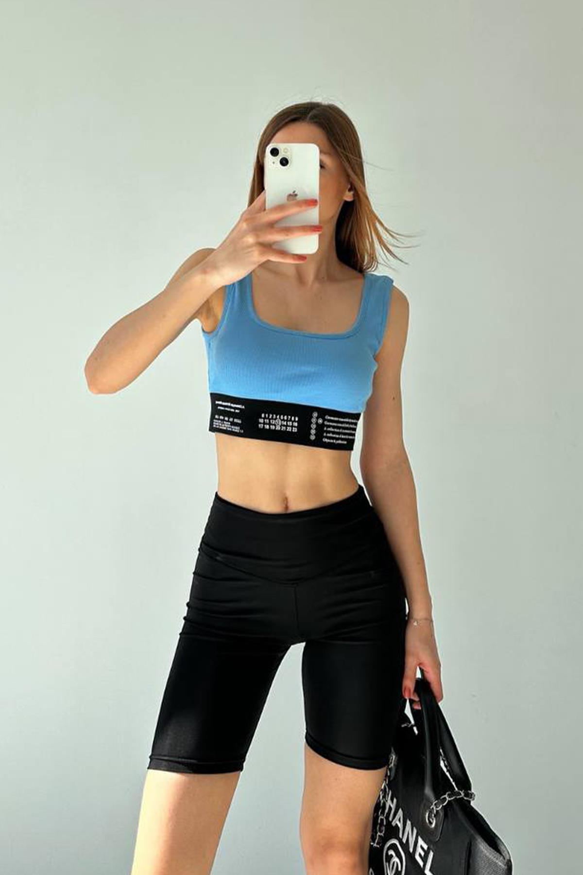 SUPPORTED CROP WITH WRITTEN WAIST DETAIL