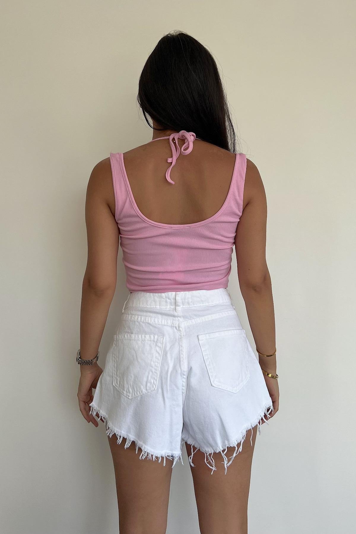 CROP-BLUSE MIT VOGELAUGEN-LINKSVERKLEIDUNG