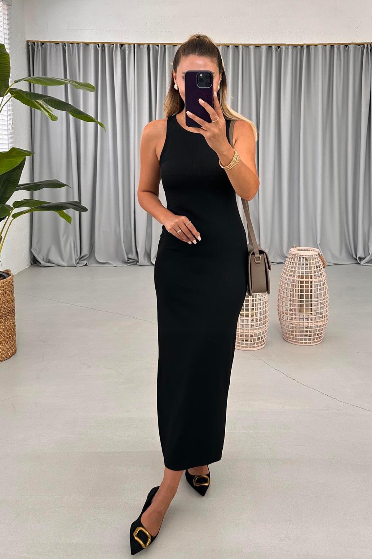 SIFIR KOL ARKA ETEĞİ YIRTMAÇLI ELBİSE SİYAH