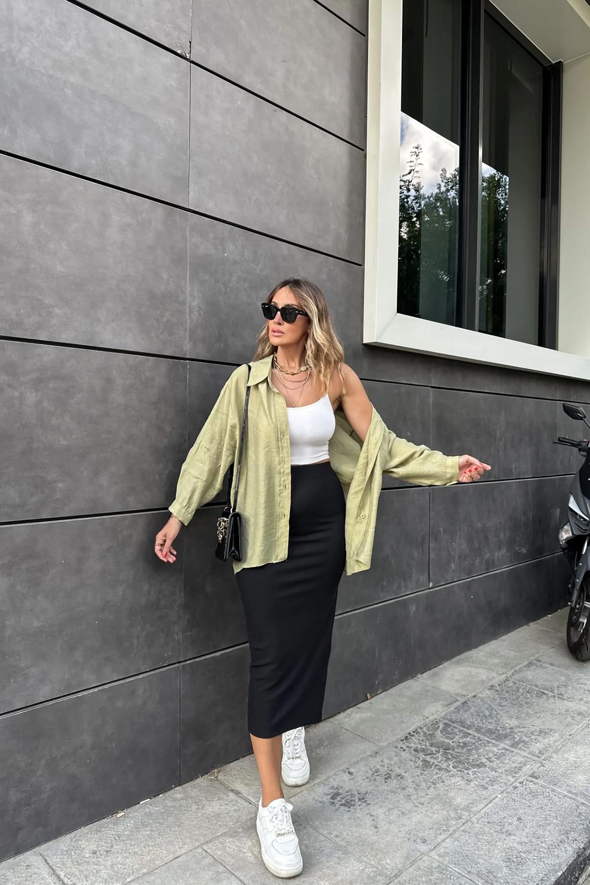 BELİ LASTİKLİ ETEĞİ YIRTMAÇLI ETEK SİYAH