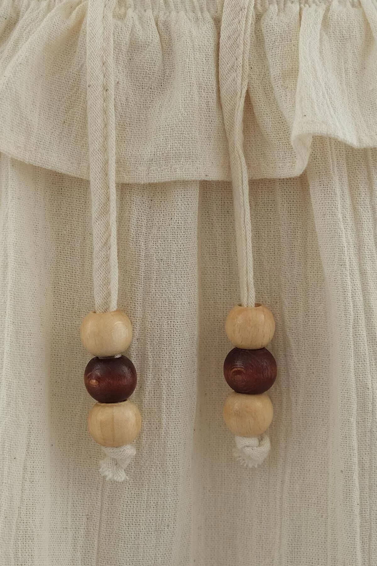 تنورة من الكتان بتفاصيل حزام وحزام