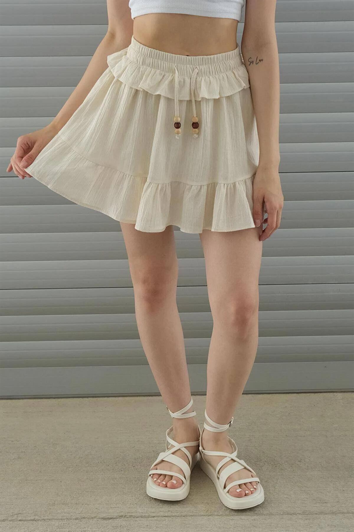 تنورة من الكتان بتفاصيل حزام وحزام