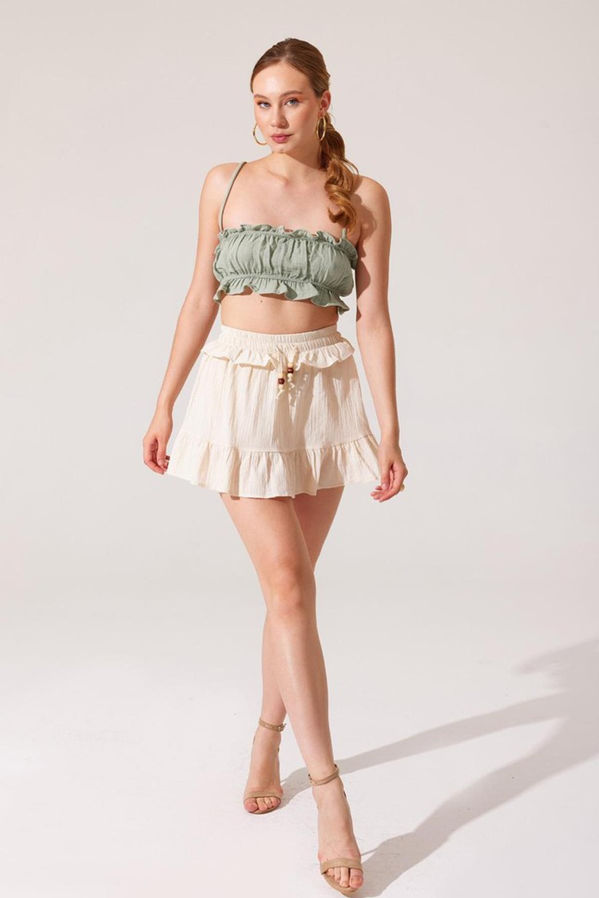 تنورة من الكتان بتفاصيل حزام وحزام