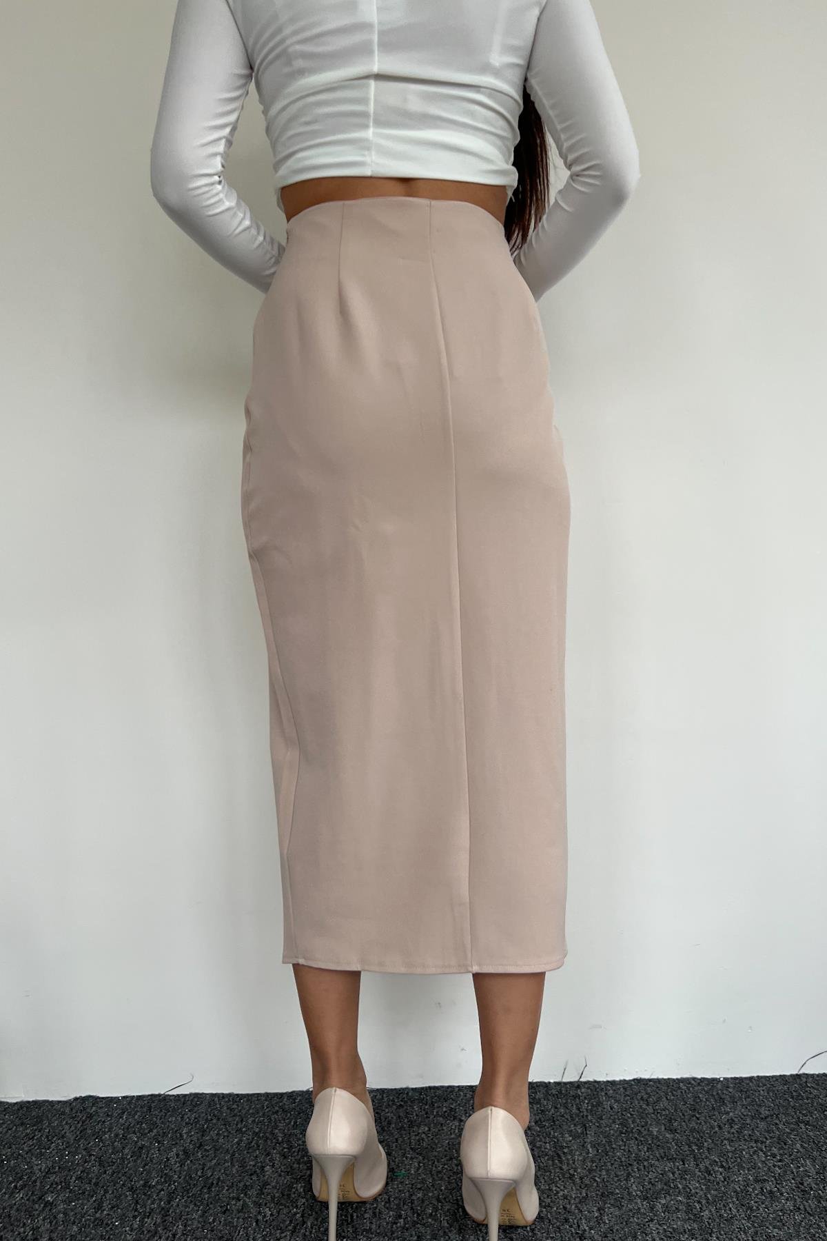 KUMAŞ ETEĞİ YIRTMAÇLI ETEK TAŞ