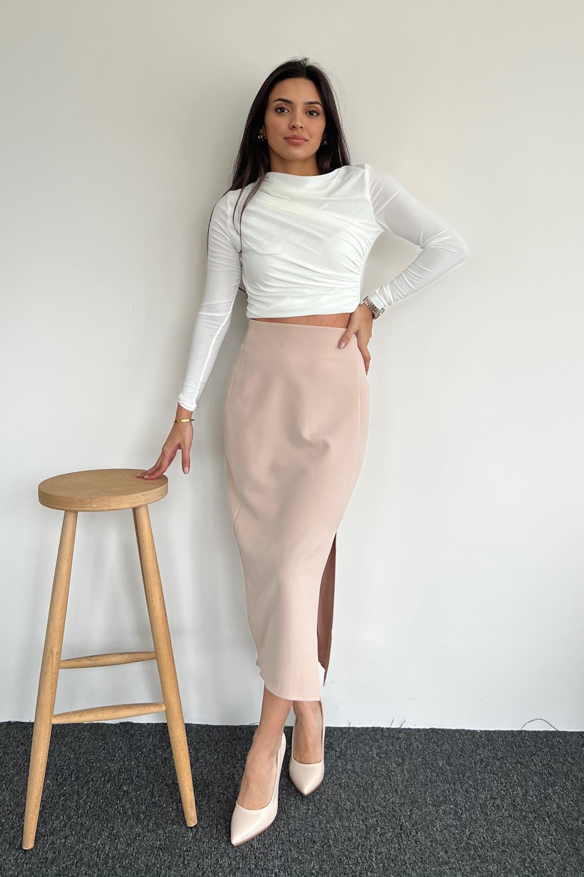 KUMAŞ ETEĞİ YIRTMAÇLI ETEK TAŞ