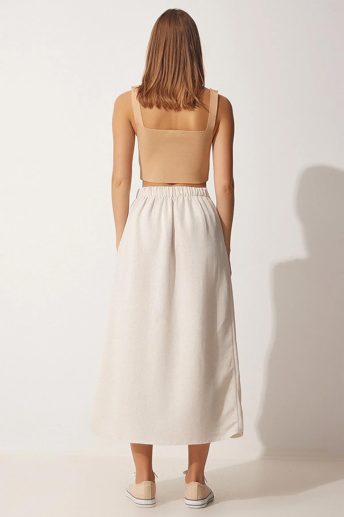 VORDERER ROCK AUS LEINEN MIT RÜSCHEN