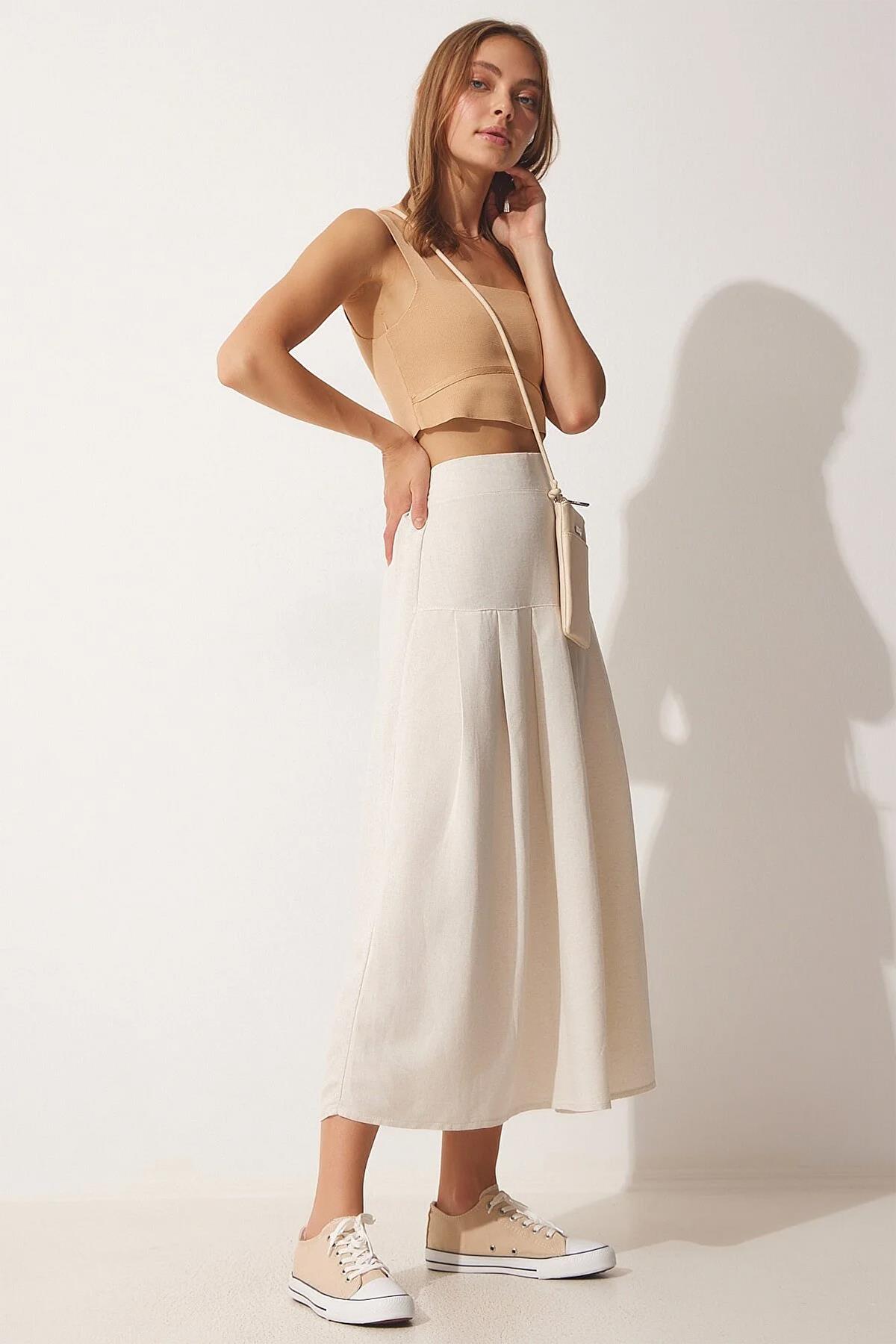 VORDERER ROCK AUS LEINEN MIT RÜSCHEN