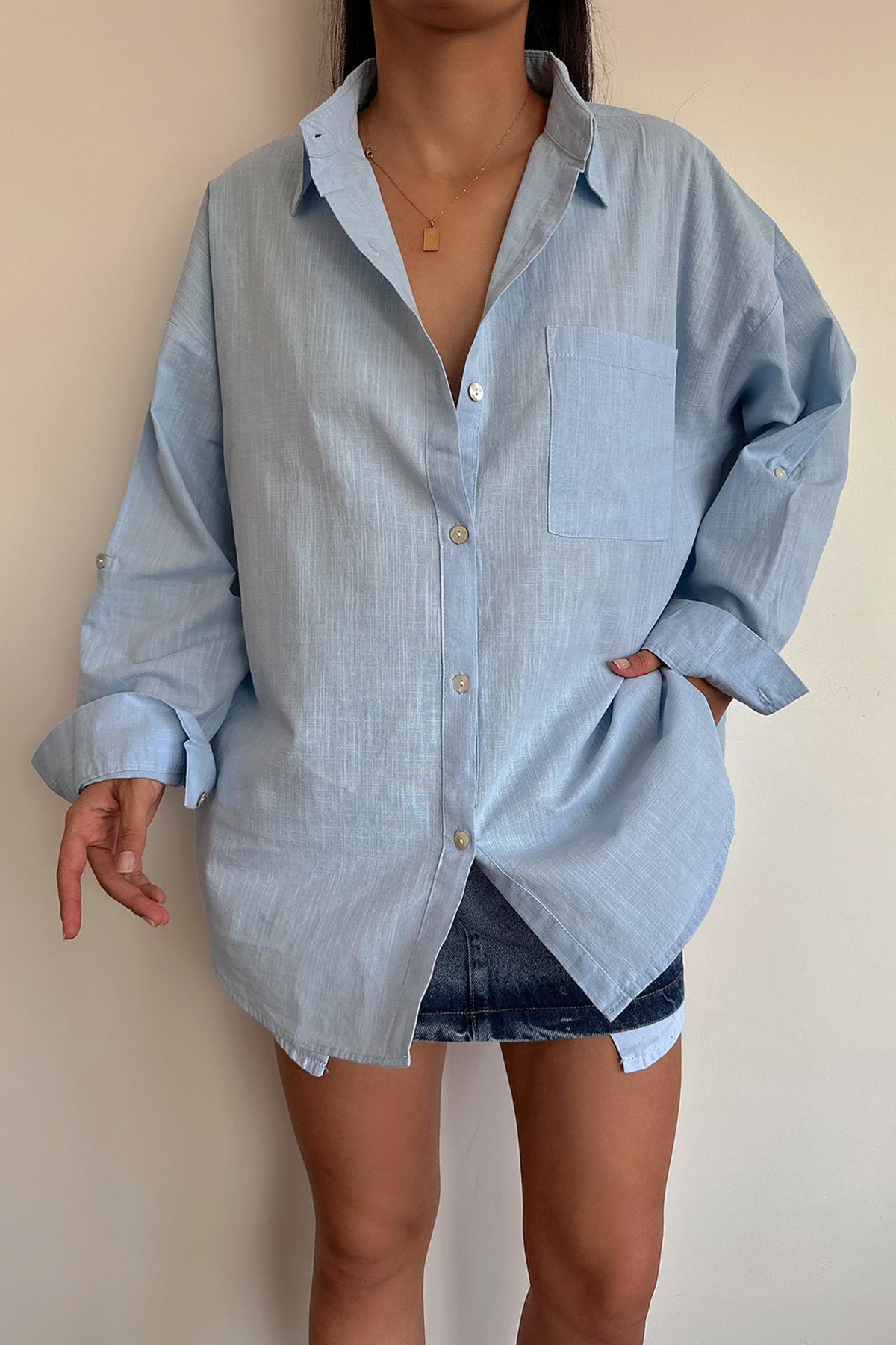 قميص كتان بأكمام مفصلة