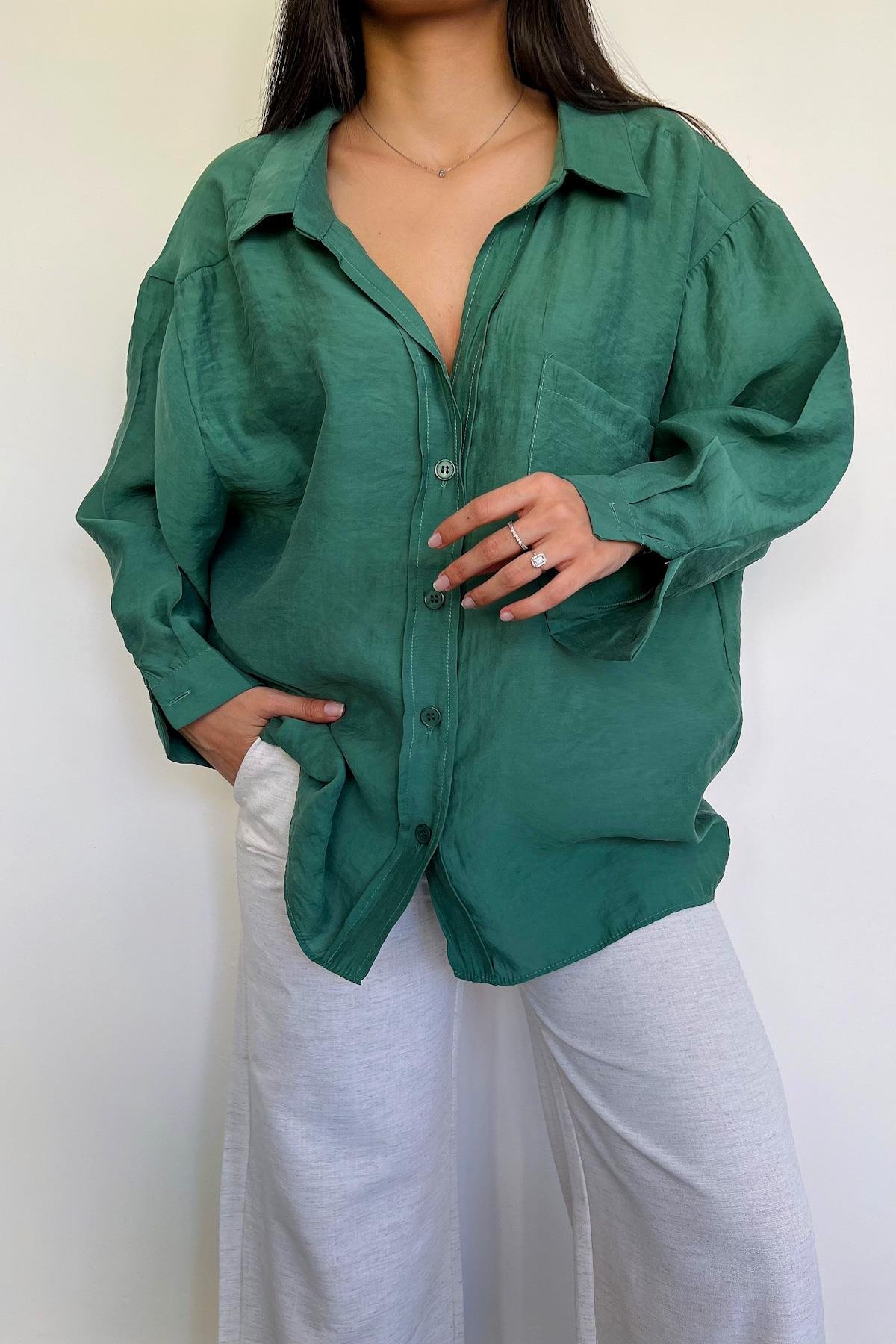 قميص كبير الحجم بأكتاف منخفضة