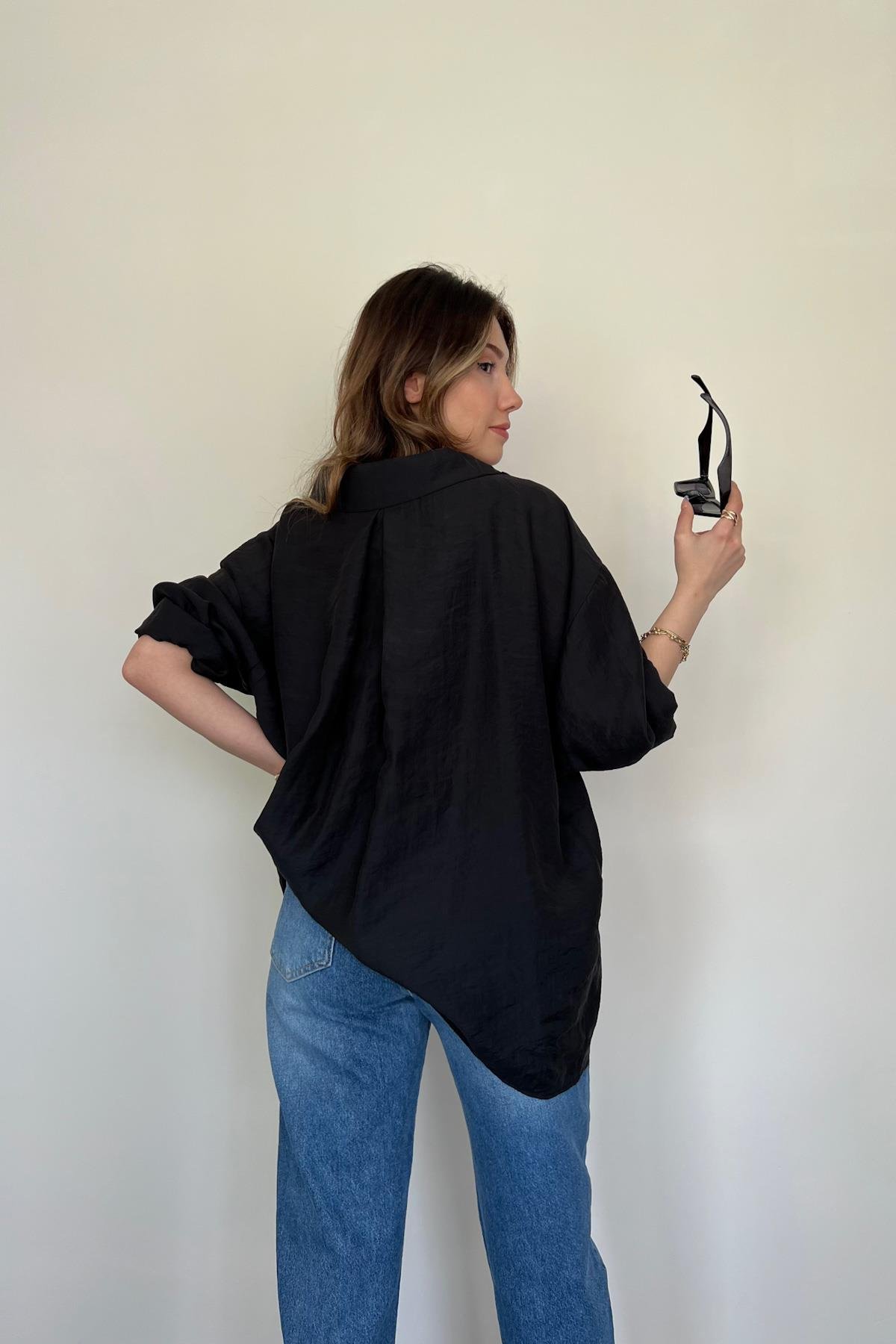 قميص كبير الحجم بأكتاف منخفضة