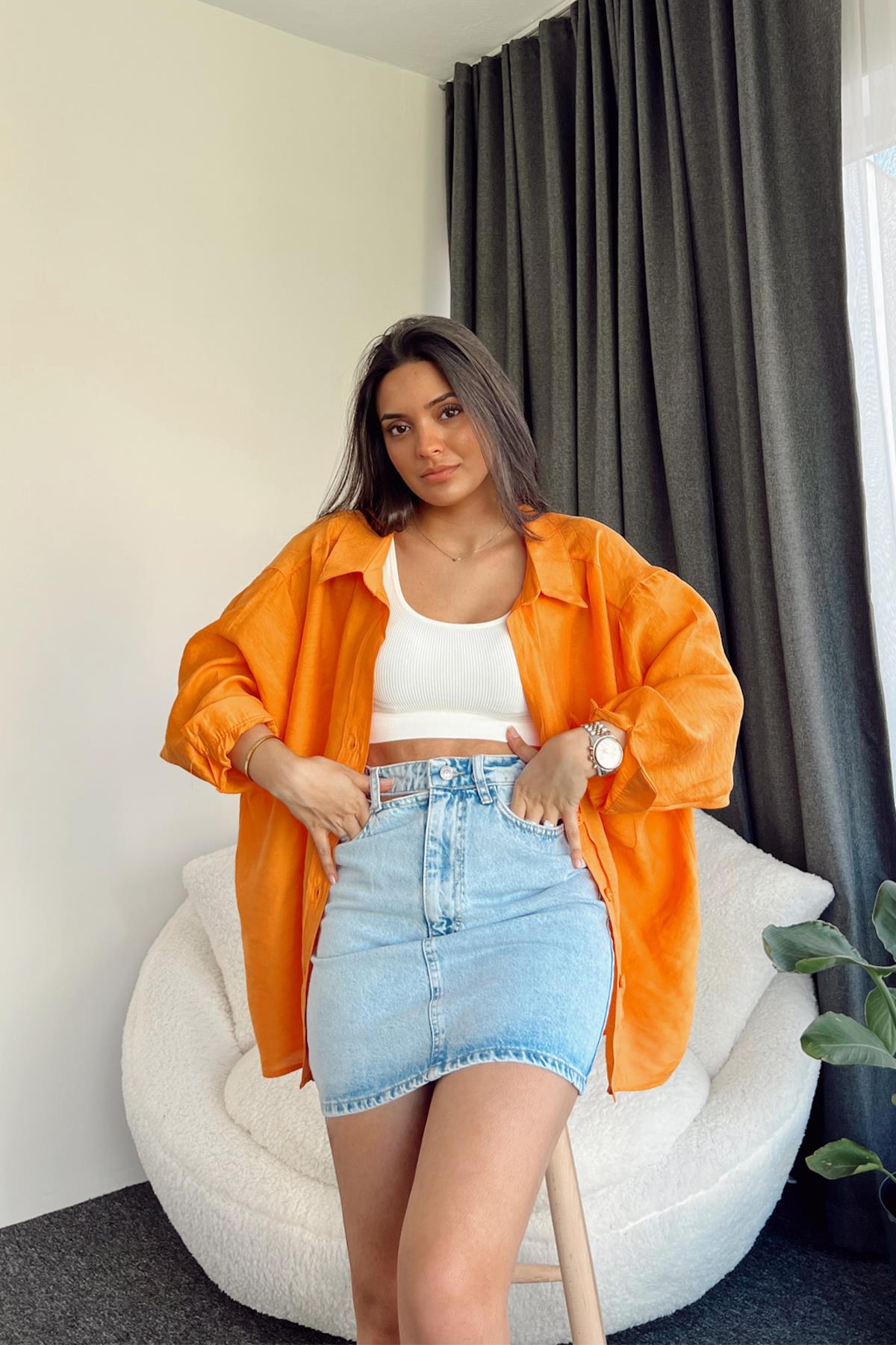 قميص كبير الحجم بأكتاف منخفضة