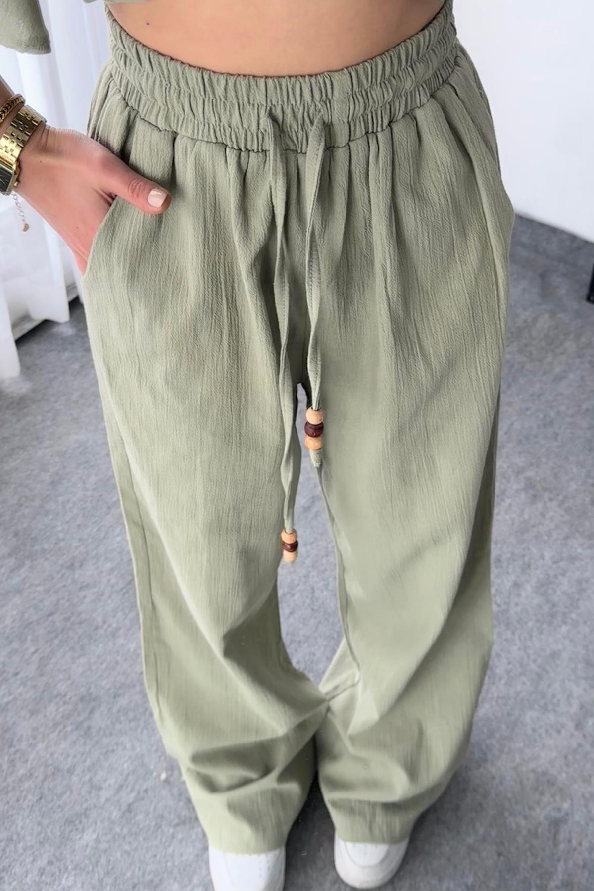 خصر مرن وسروال قطني طويل الأرجل بتفاصيل الخرز