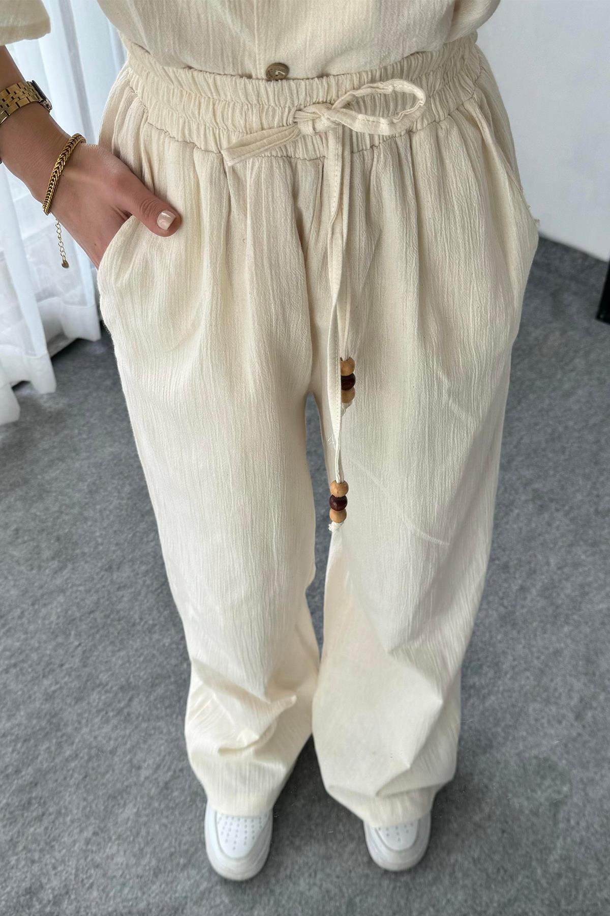 خصر مرن وسروال قطني طويل الأرجل بتفاصيل الخرز