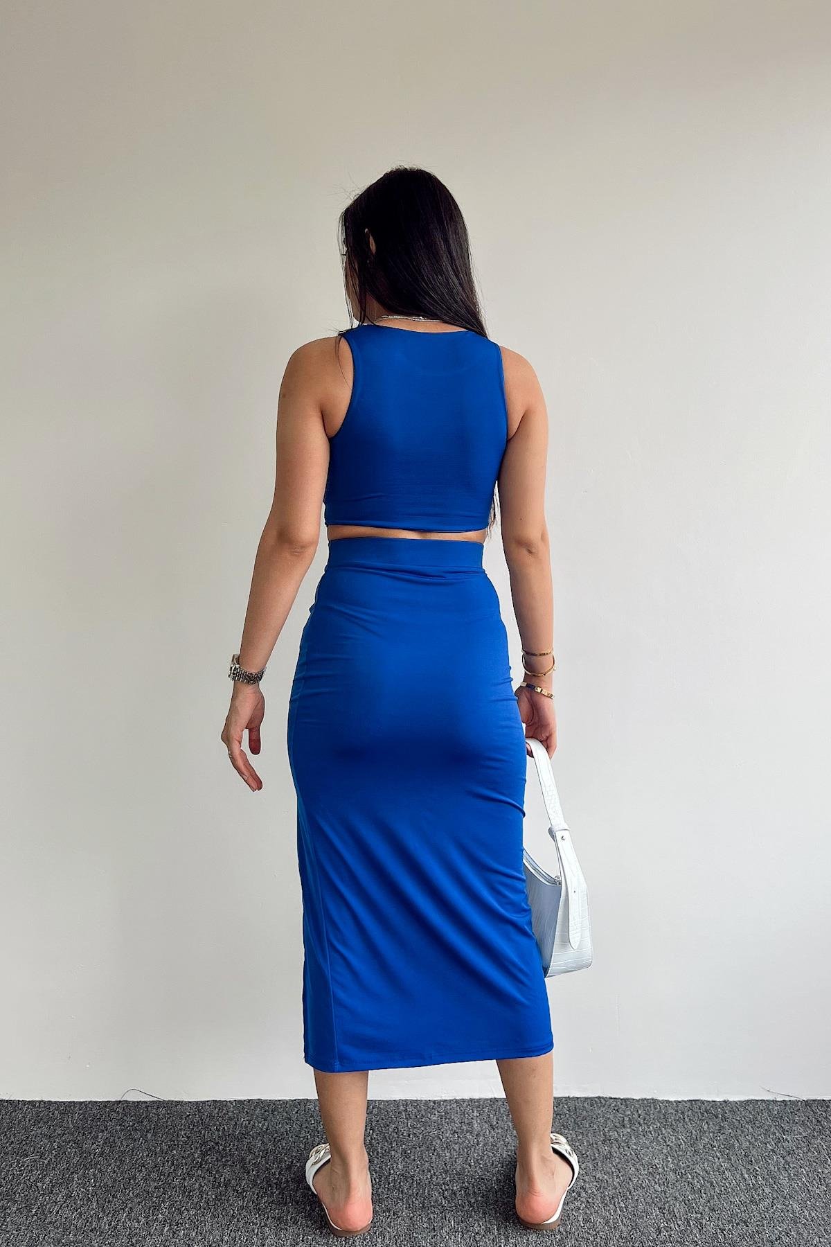 КОСТЮМ С УКОРОЧЕННОЙ ЮБКОЙ БЕЗ РУКАВОВ