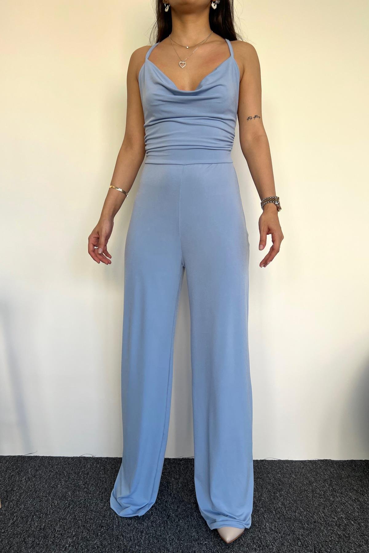 SIRT DETAYI İPLİ TULUM