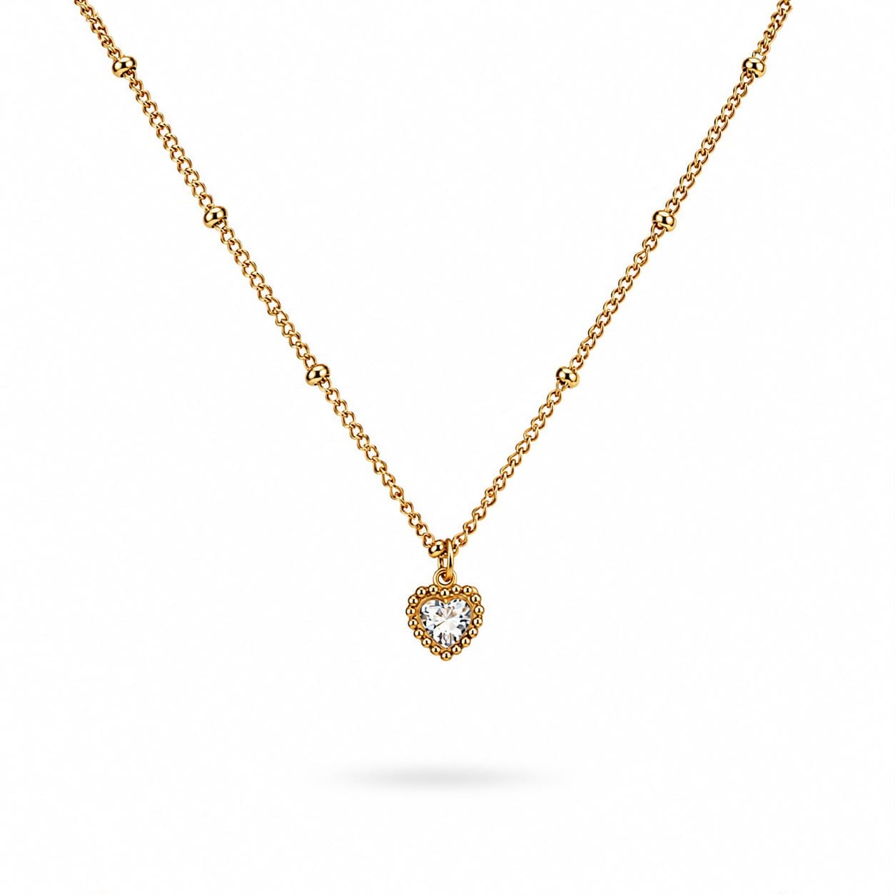 ​​Welch Gold Kaplama Çelik Minimal Taşlı Kalp Kolye  ​​Welch Gold Kaplama Çelik Minimal Taşlı Kalp Kolye Modelleri – Çelik Kolye Modelleri Welch  