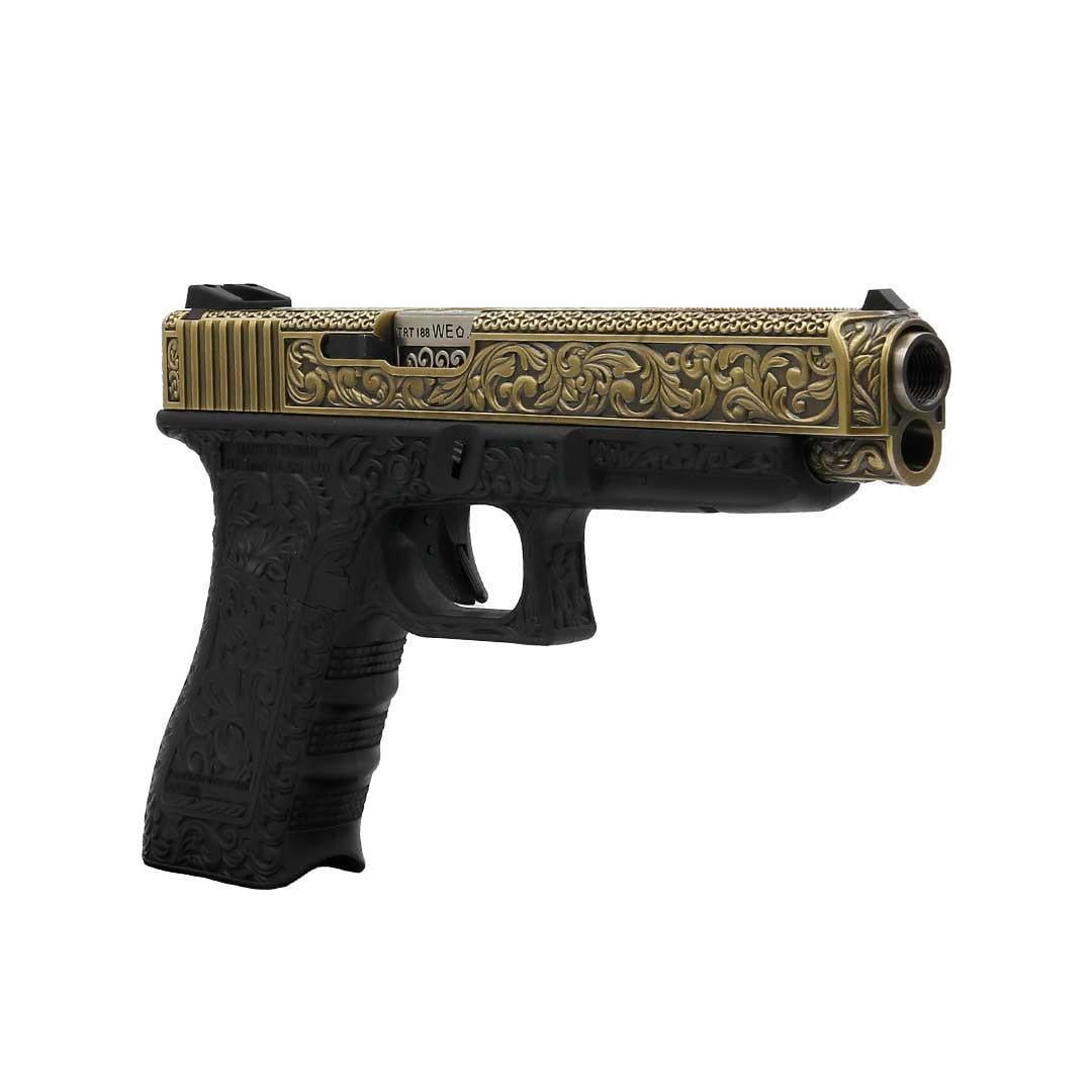 We Glock 34 Ivory Gravürlü Airsoft Tabanca + Green Gas + 0.20gr BB + Taşıma Çantası + Balistik Gözlük