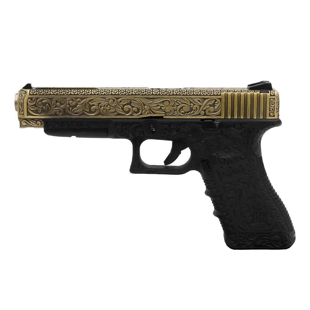 We Glock 34 Ivory Gravürlü Airsoft Tabanca + Green Gas + 0.20gr BB + Taşıma Çantası + Balistik Gözlük