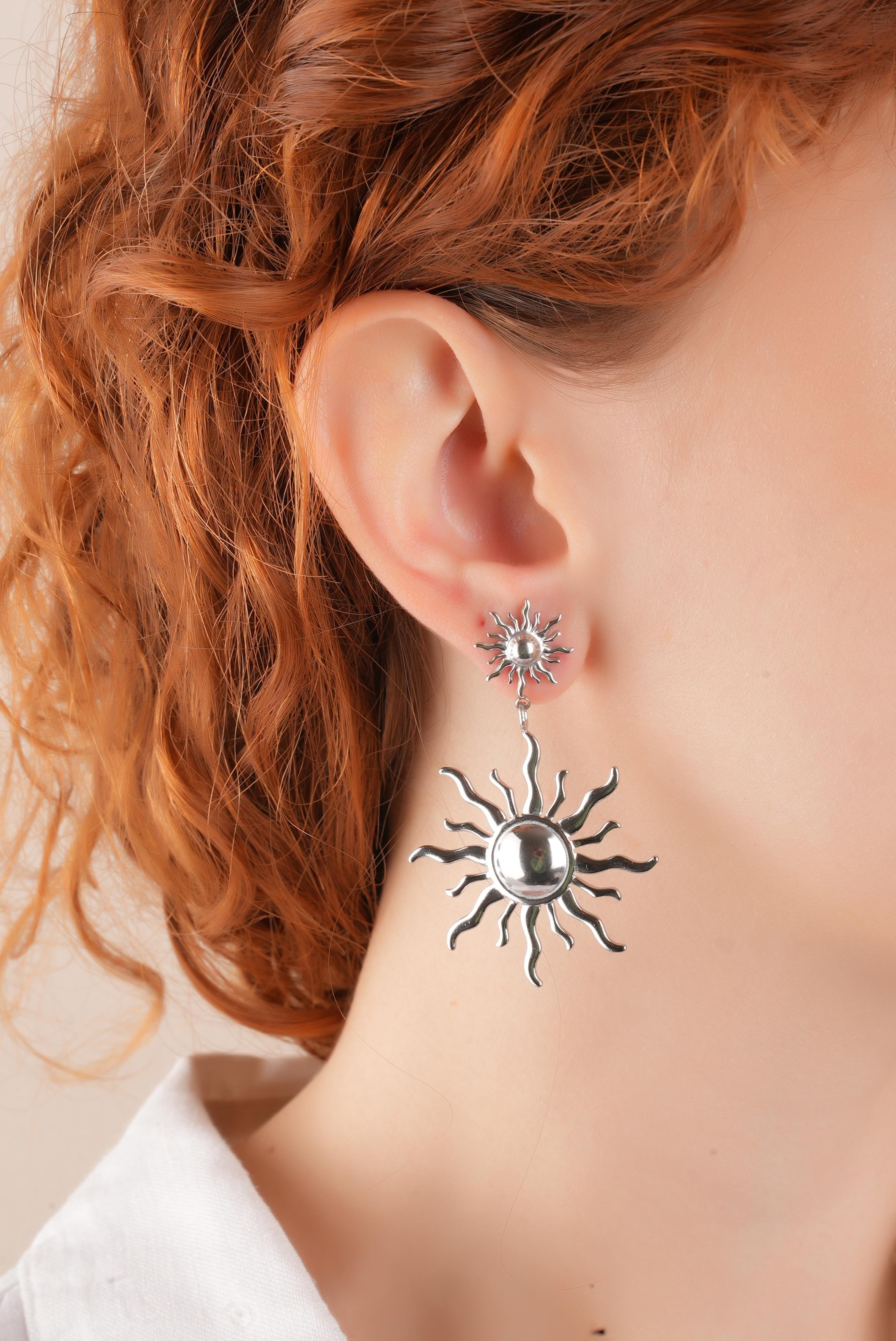 Çelik Plaka Sallantılı Güneş Küpe 35640