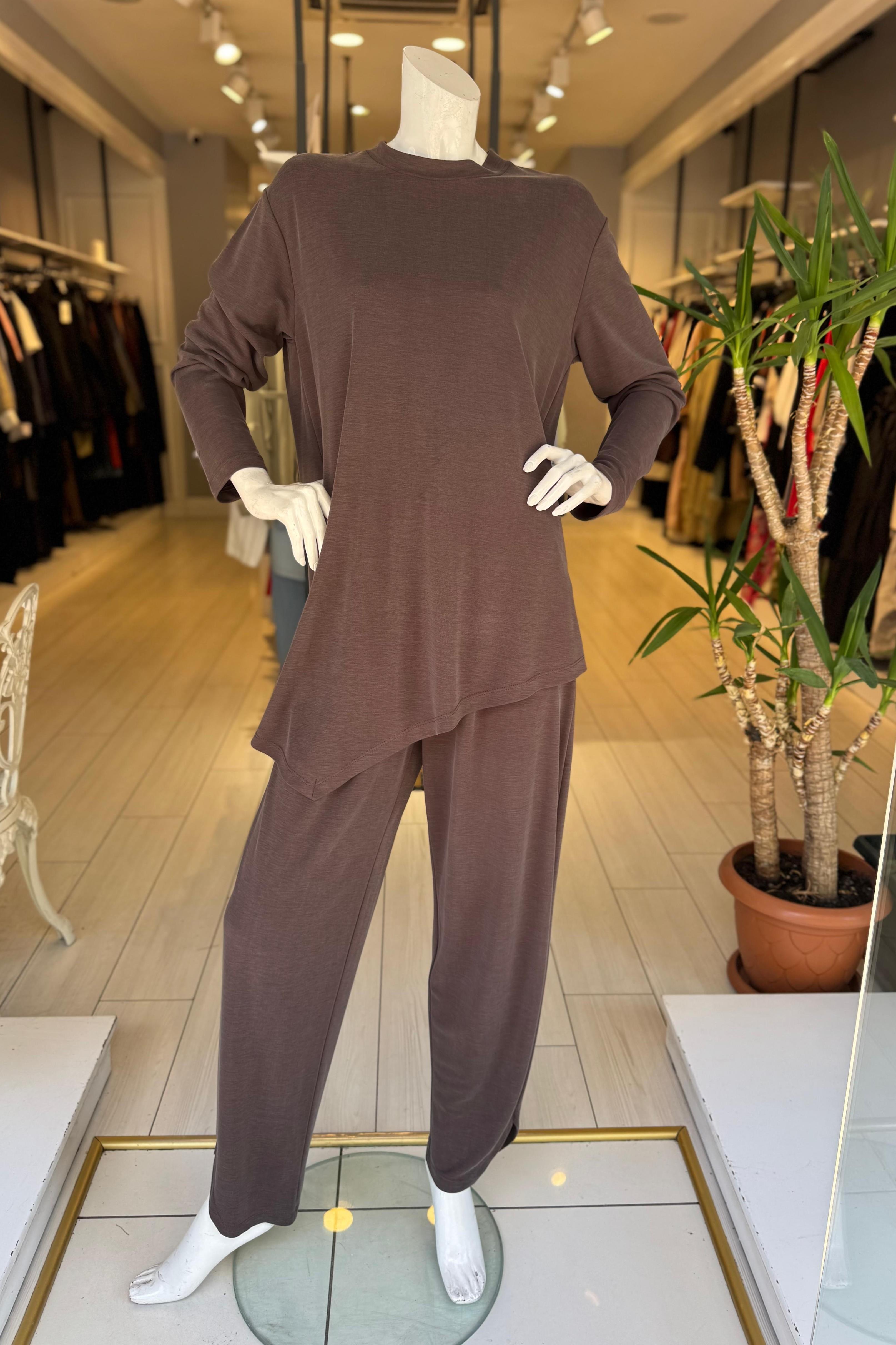 OE26KZ1011 OMELYA TAKIM