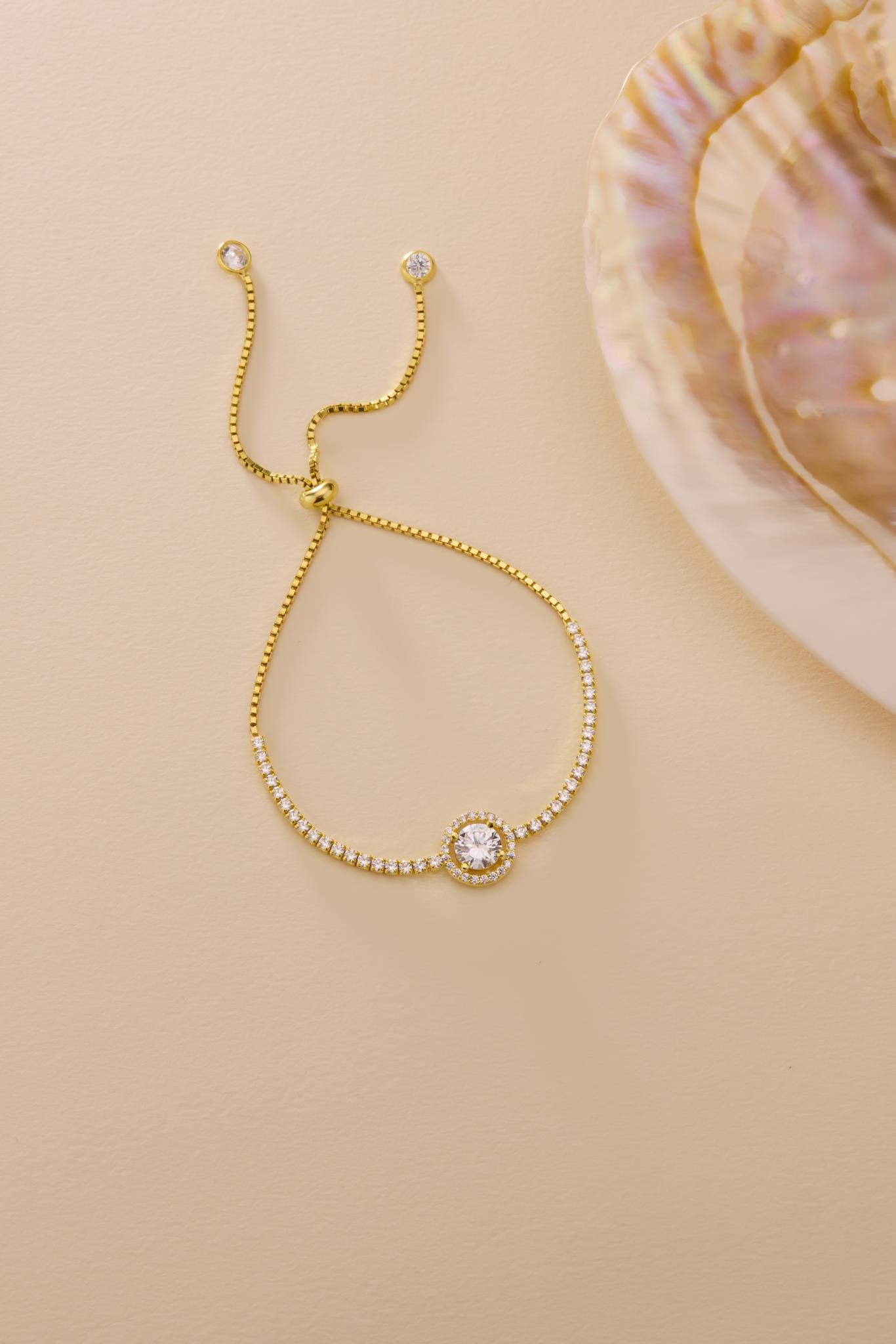 925 Ayar Gümüş Gold Kaplama Ayarlanabilir Asansörlü Su Yolu 7 mm Yuvarlak Tektaş Model Bileklik