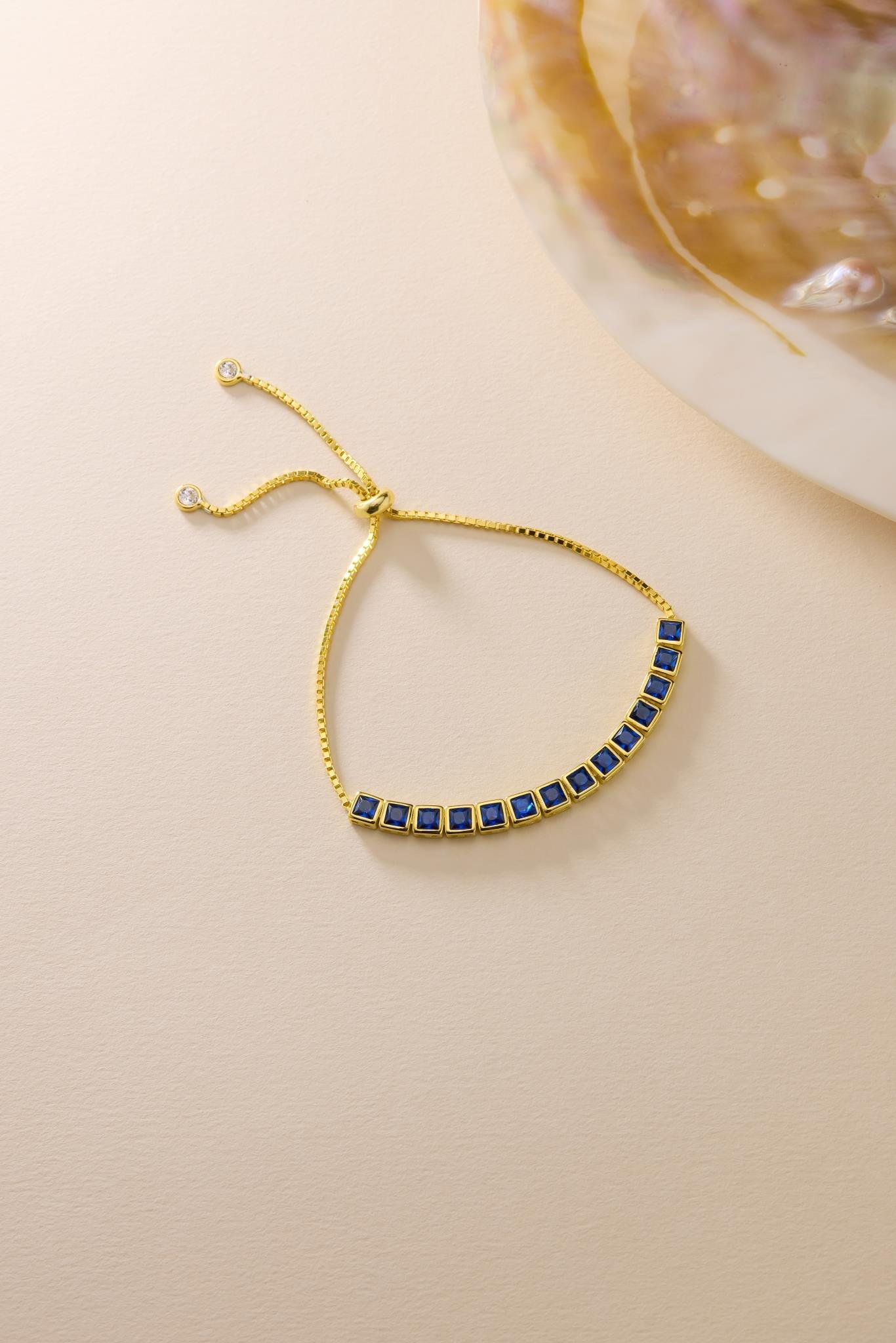 925 Ayar Gümüş Gold Kaplama Ayarlanabilir Asansörlü  Sıralı Kare Mavi Taşlı Bileklik