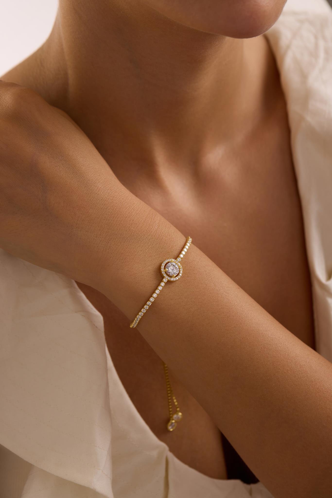 925 Ayar Gümüş Gold Kaplama Ayarlanabilir Asansörlü Su Yolu 7 mm Yuvarlak Tektaş Model Bileklik