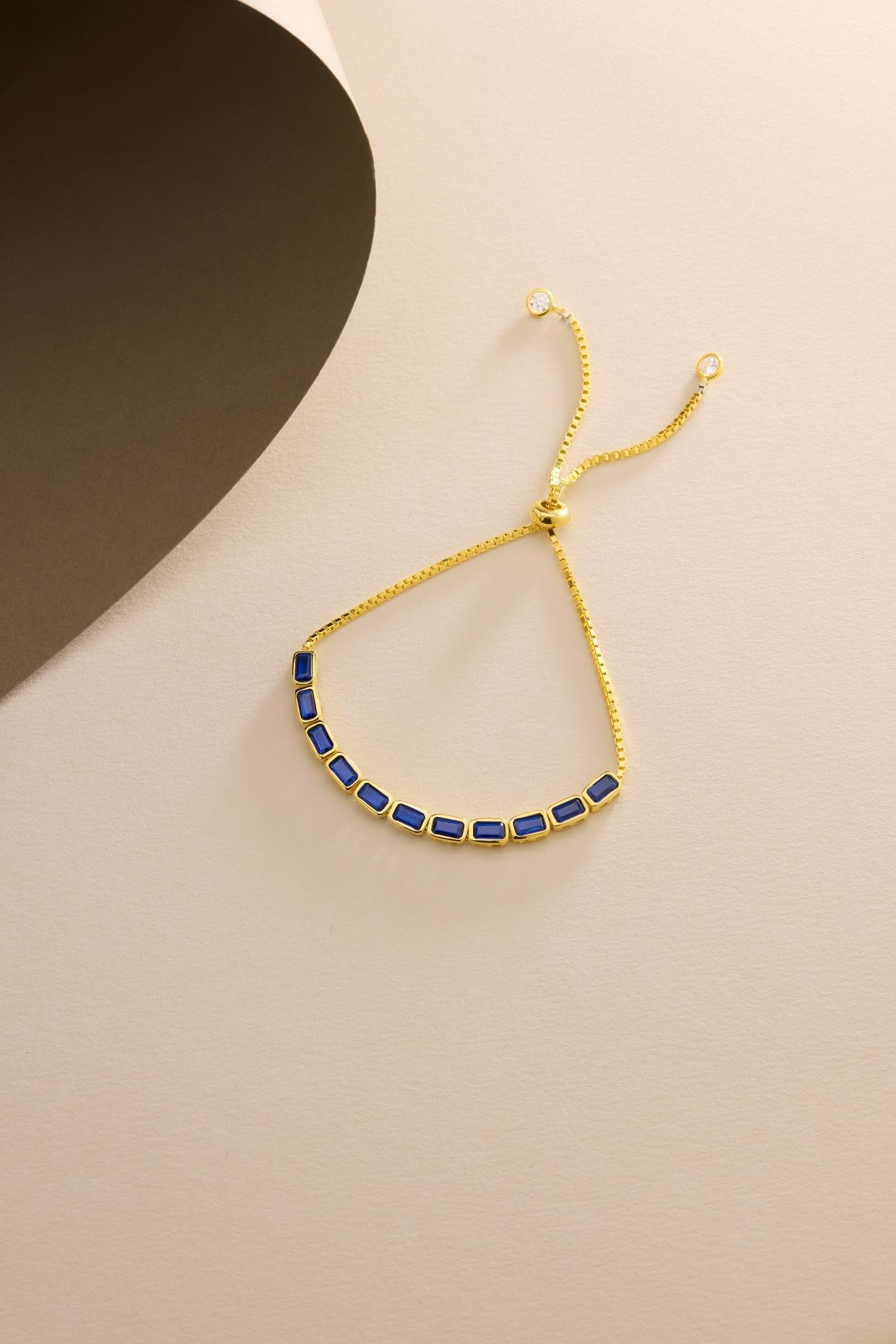 925 Ayar Gümüş Gold Kaplama Ayarlanabilir Asansörlü Sıralı Mavi Baget Taşlı Bileklik