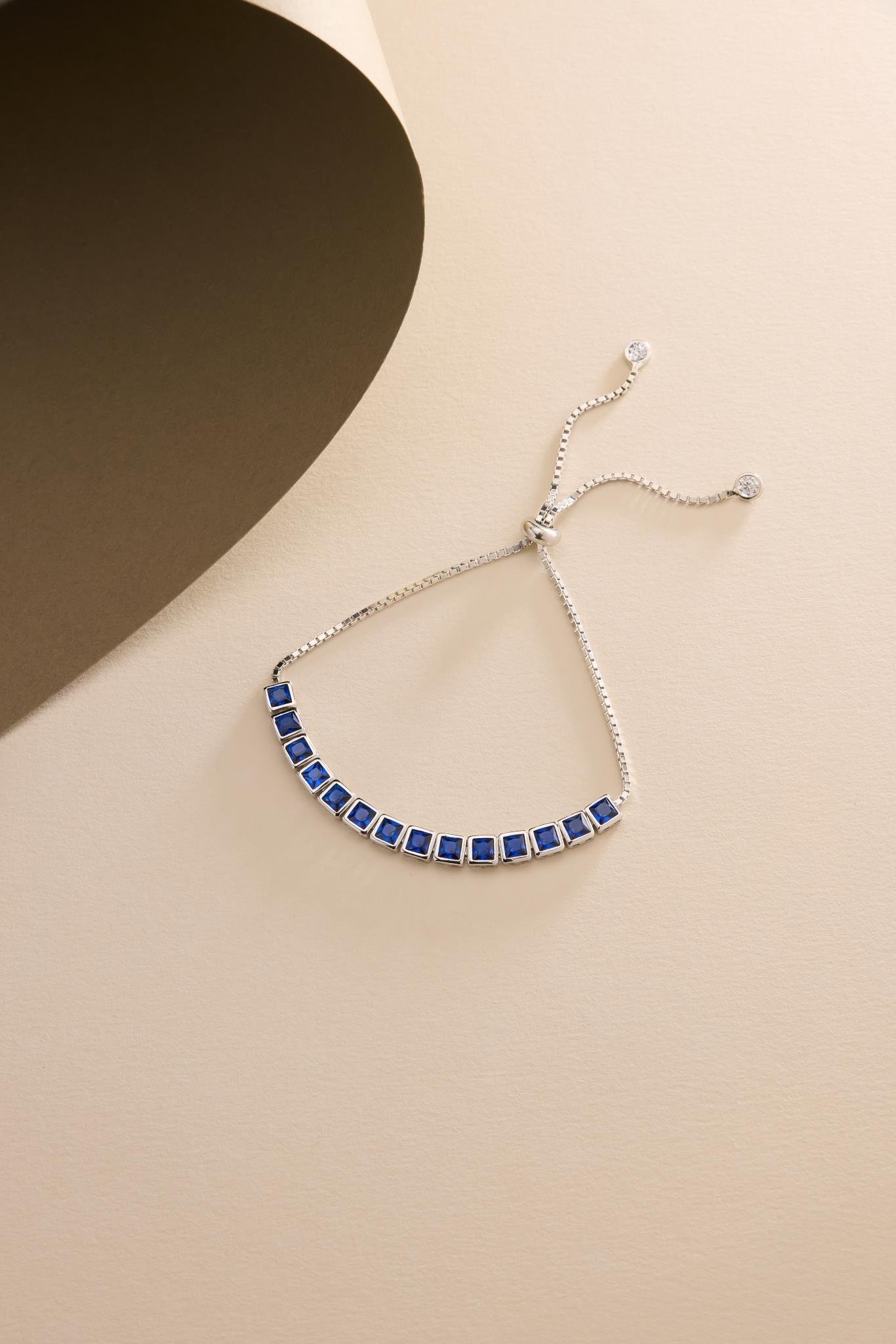 925 Ayar Gümüş Rodyum Kaplama Ayarlanabilir Asansörlü  Sıralı Kare Mavi Taşlı Bileklik