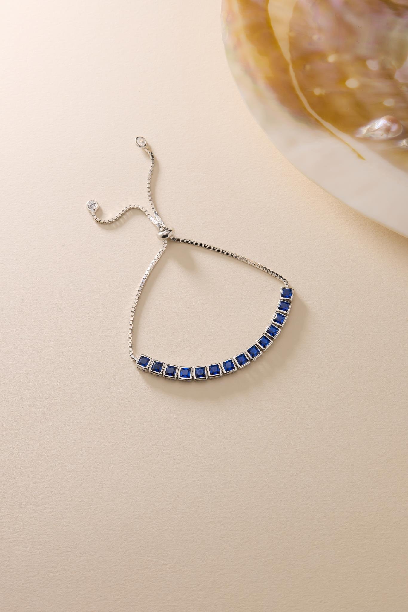 925 Ayar Gümüş Rodyum Kaplama Ayarlanabilir Asansörlü  Sıralı Kare Mavi Taşlı Bileklik