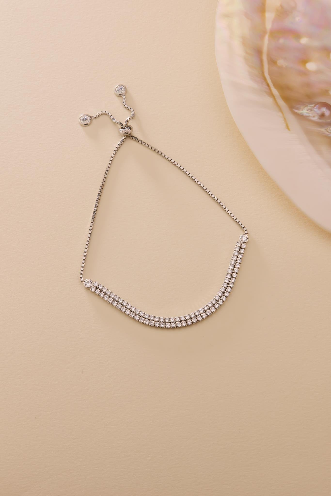 925 Ayar Gümüş Rodyum Kaplama Ayarlanabilir Asansörlü 2 mm Zirkon Taşlı Çift Sıra Su Yolu Bileklik