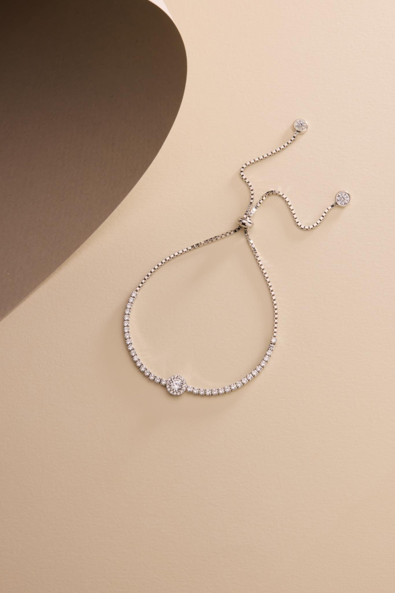 925 Ayar Gümüş Rodyum Kaplama Ayarlanabilir Asansörlü Su Yolu Tektaş Elmas Montür Bileklik