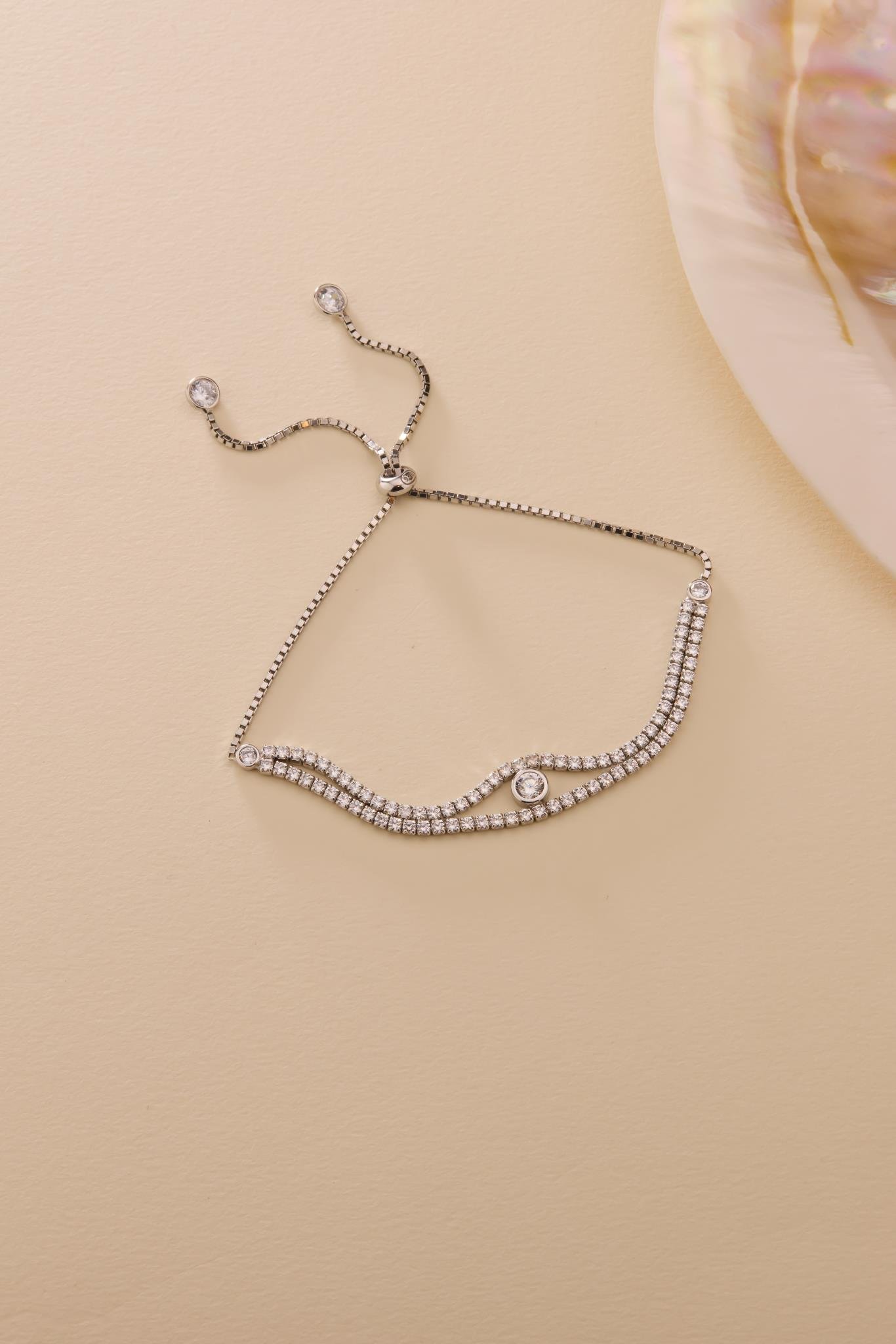 925 Ayar Gümüş Rodyum Kaplama Ayarlanabilir Asansörlü  Çift Sıra Su Yolu Tektaş Model Bileklik