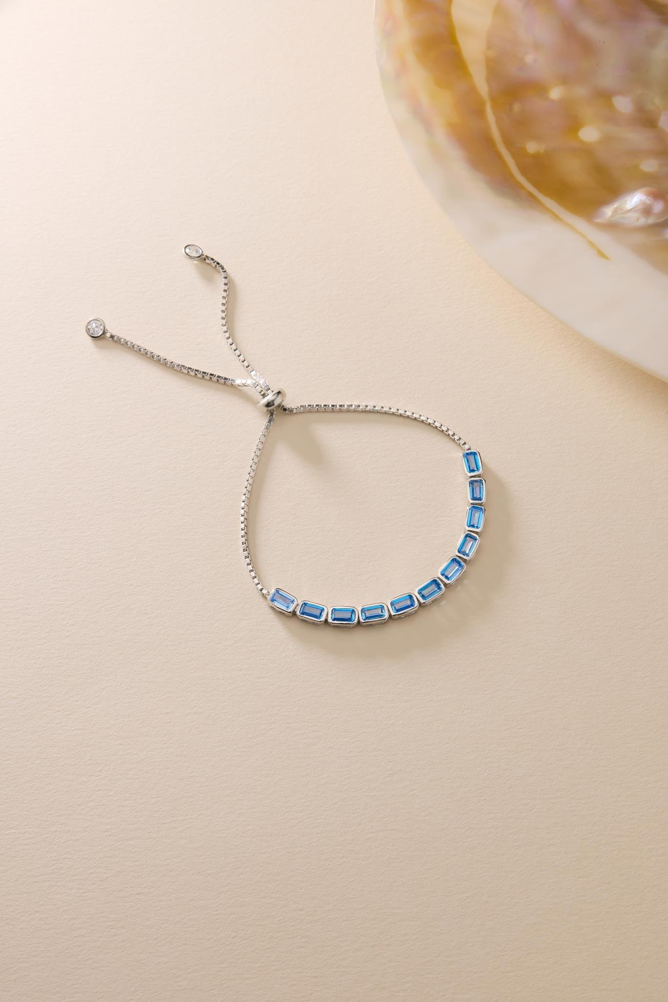 925 Ayar Gümüş Rodyum Kaplama Ayarlanabilir Asansörlü Sıralı Aquamarin Baget Taşlı Bileklik