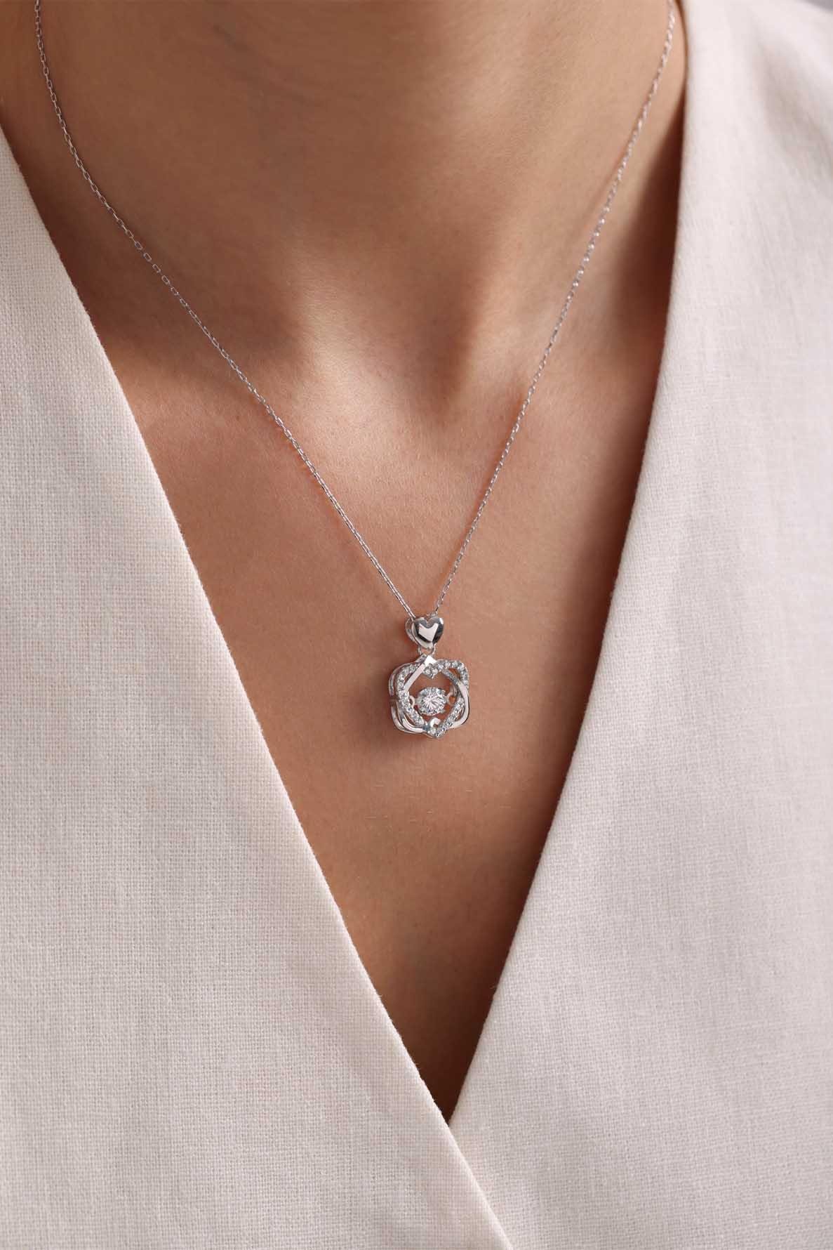 925 Ayar Gümüş Rodyum Kaplama Hareketli Minik Taşlı Çift Kalpli Model Kolye