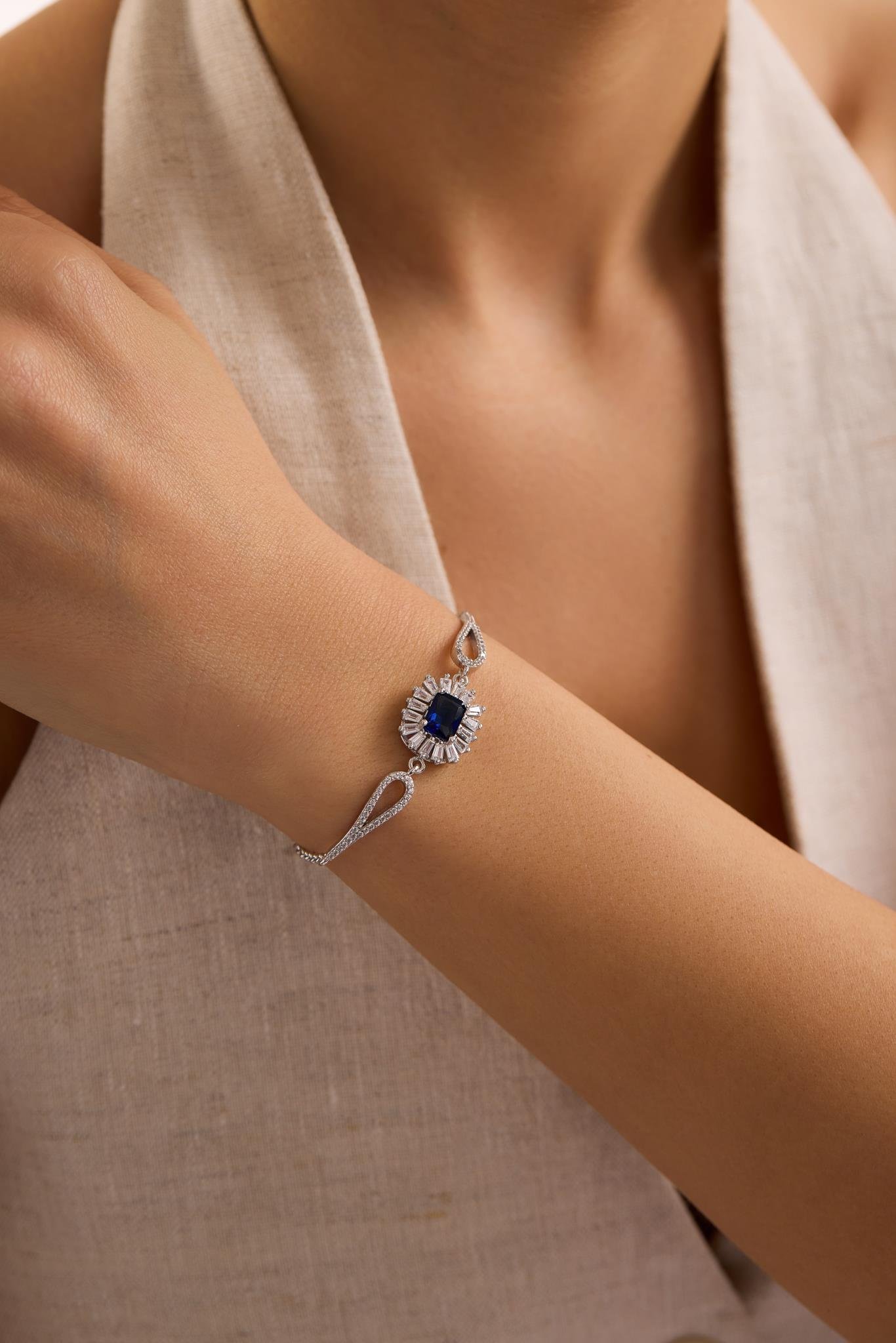 925 Ayar Gümüş Rodyum Kaplama Kelepçe Model Baget Mavi Tektaş Bileklik