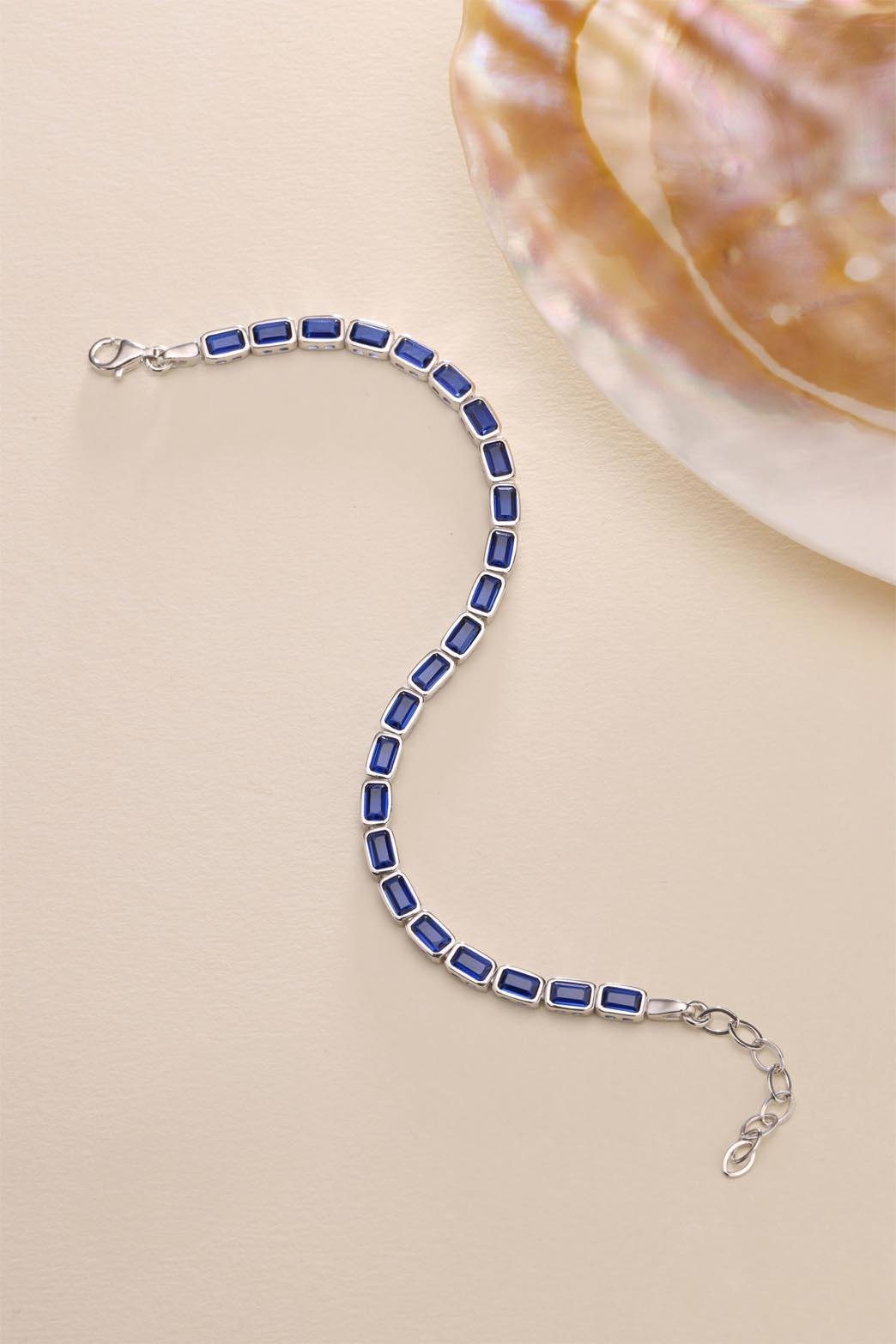 925 Ayar Gümüş Rodyum Kaplama Mavi Baget Taşlı Suyolu Bileklik 