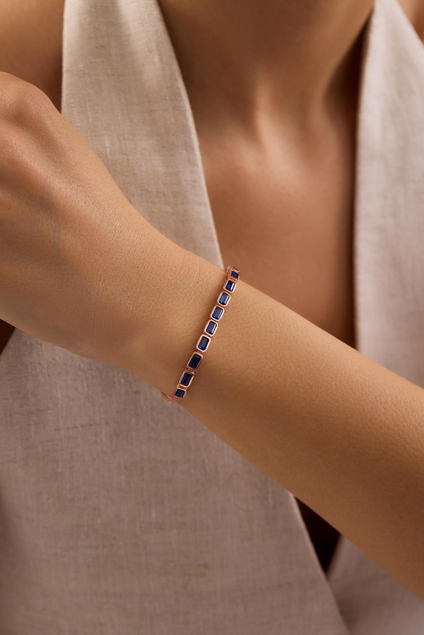 925 Ayar Gümüş Rose Kaplama Ayarlanabilir Asansörlü Sıralı Mavi Baget Taşlı Bileklik