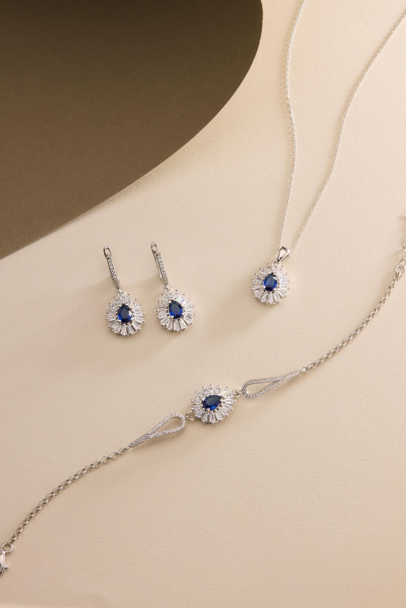 925 Ayar Gümüş Set Rodyum Kaplama Damla Mavi Taşlı Kolye,Bileklik ve Küpe