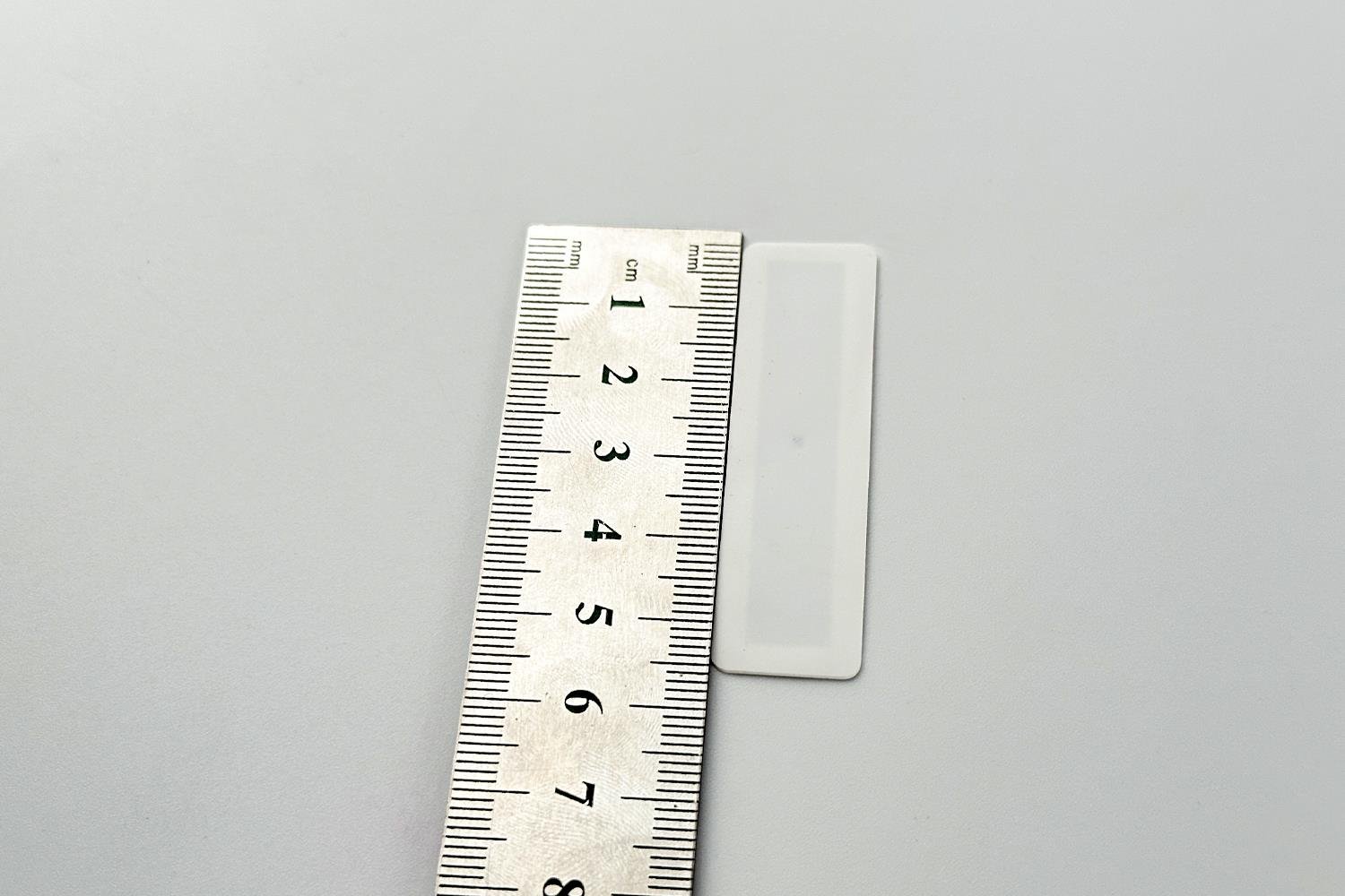 Yıkamaya ve Ütüye Dayanıklı R6P Logolu UHF Hard Tag