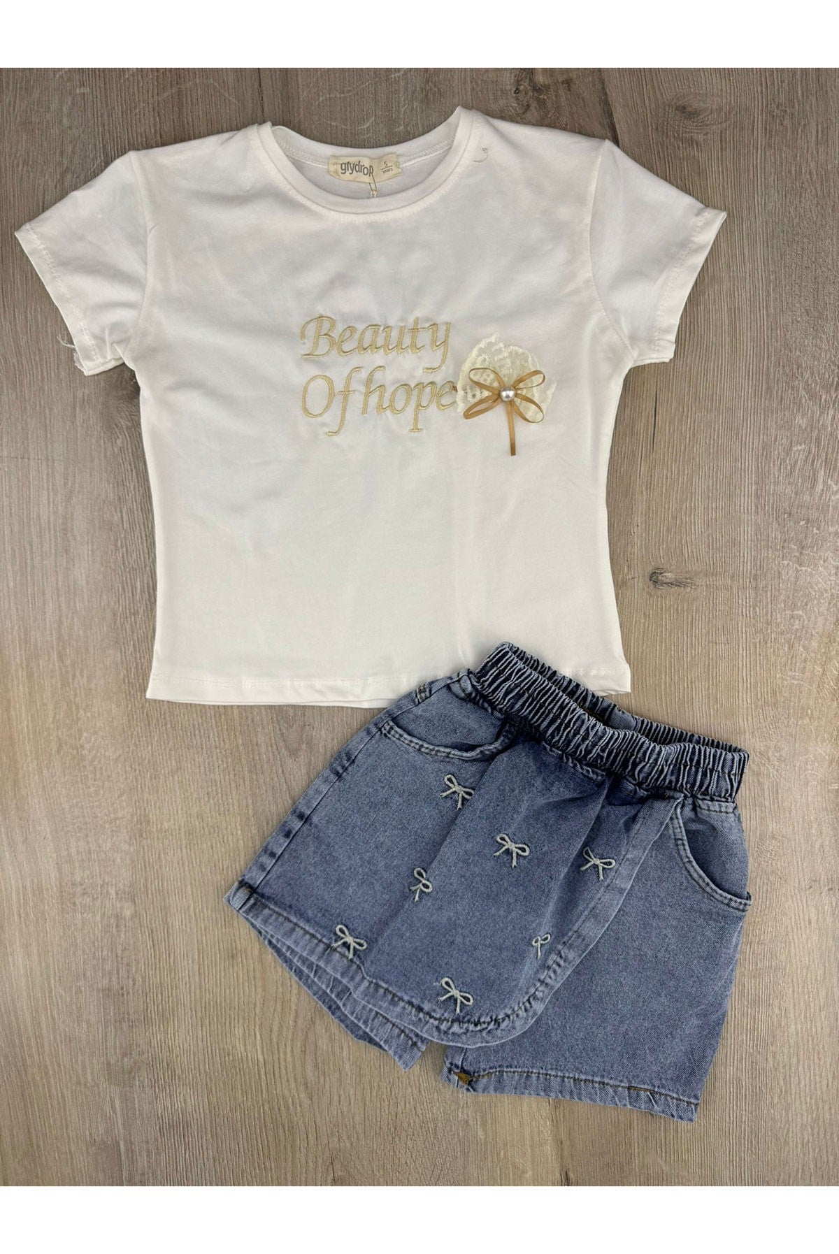 Giydrop (5-8 Yaş) Fiyonk Desenli Kot Şort Etekli Takım